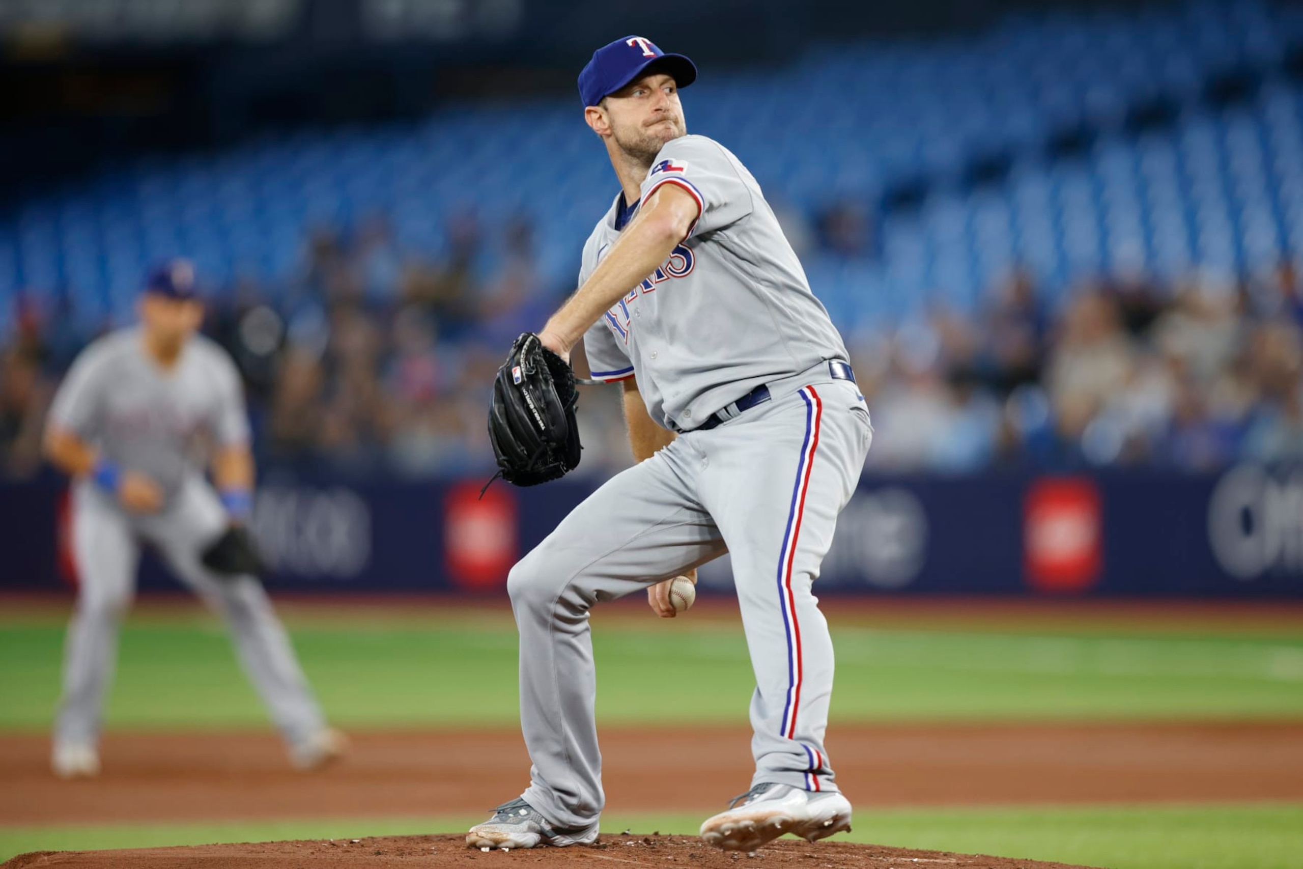 TORONTO, CANADA - SEPTEMBER 12: Max Scherzer #31 of the Texas Rangers pitches in the first inning against the Toronto Blue Jays at Rogers Centre on September 12, 2023 in Toronto, Canada. (Photo by Cole Burston/Getty Images)