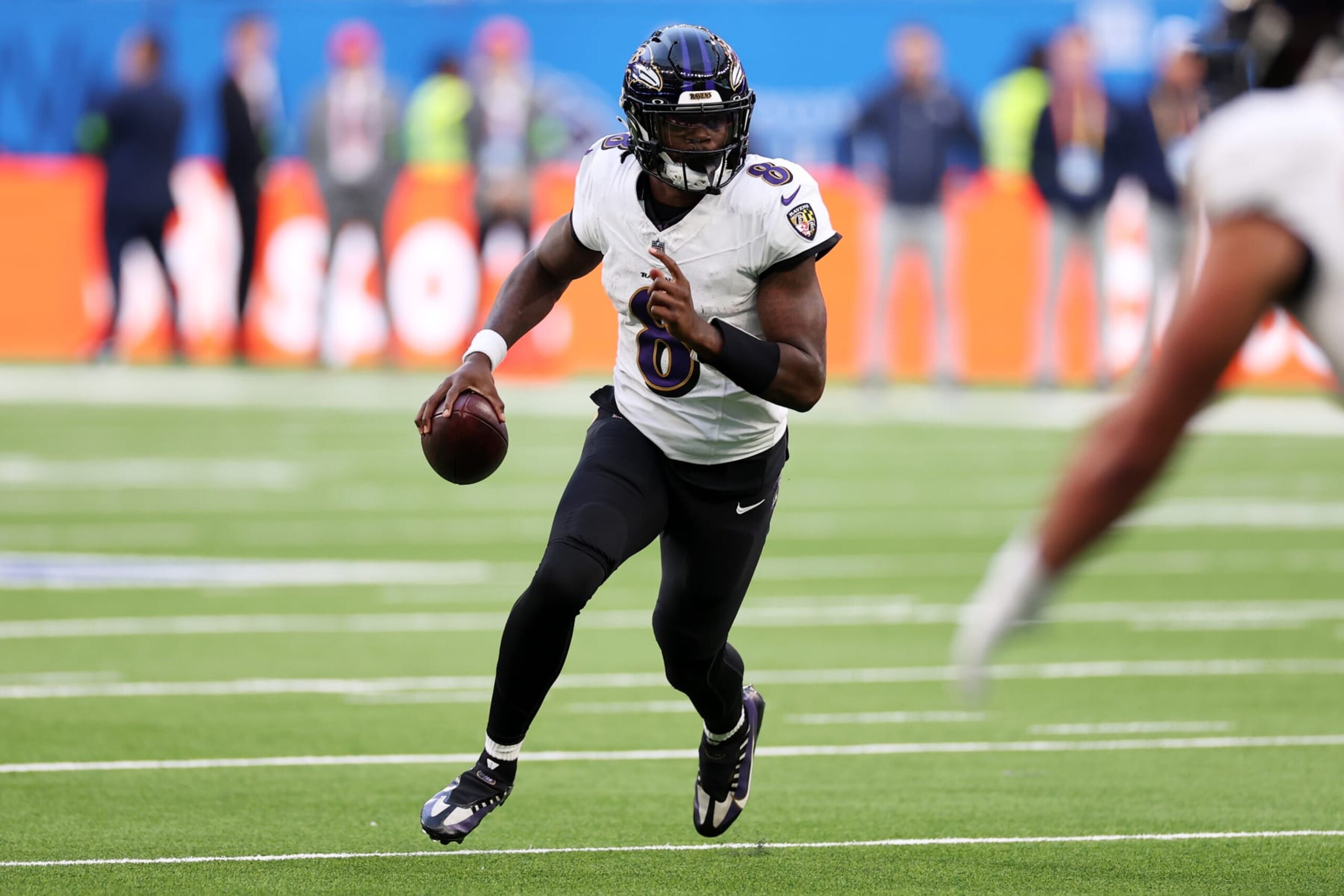 LONDON, ENGLAND - OCTOBER 15: Lamar Jackson #8 of the Baltimore Ravens looks to pass in the third quarter during the 2023 NFL London Games match between Baltimore Ravens and Tennessee Titans at Tottenham Hotspur Stadium on October 15, 2023 in London, England. (Photo by Ryan Pierse/Getty Images)