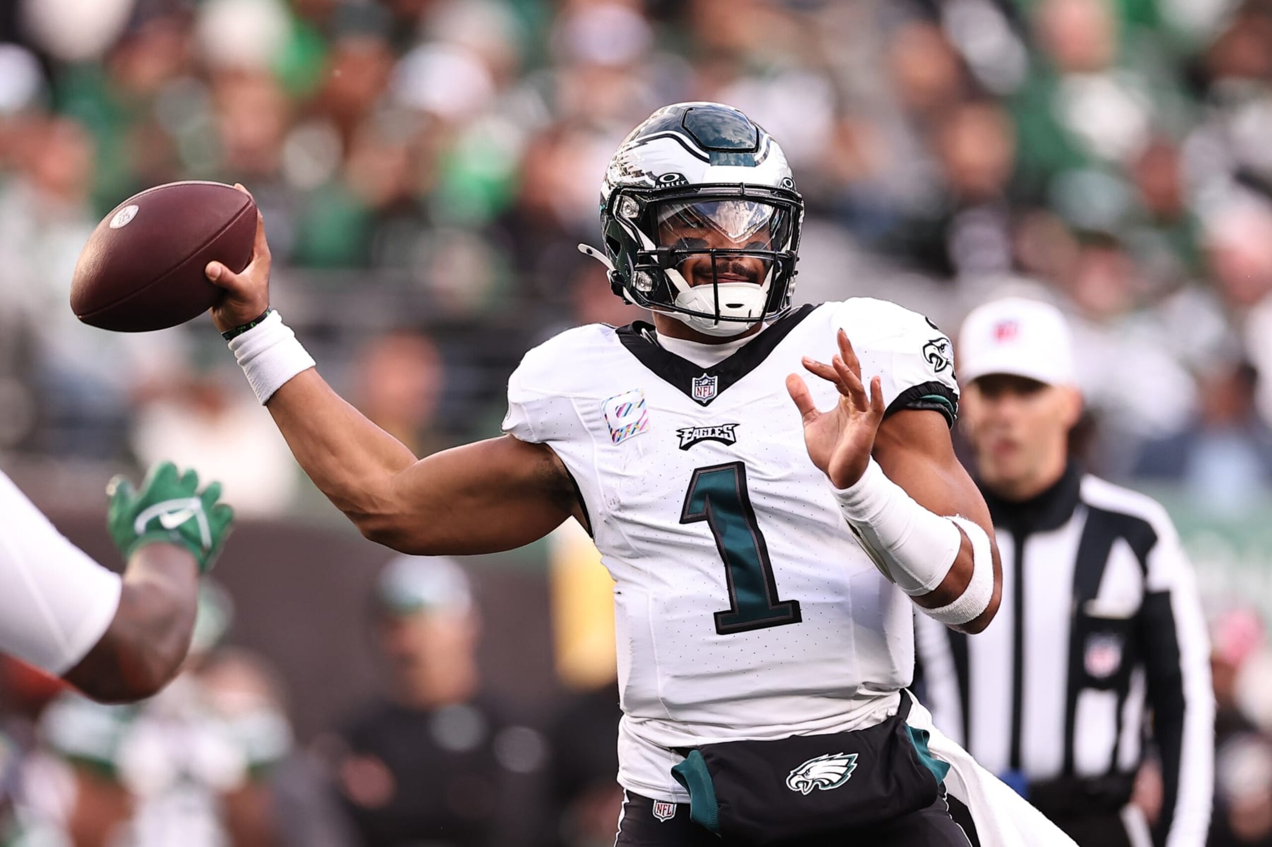 EAST RUTHERFORD, NEW JERSEY - OCTOBER 15: Jalen Hurts #1 of the Philadelphia Eagles throws the ball during the first half in the game against the New York Jets at MetLife Stadium on October 15, 2023 in East Rutherford, New Jersey. (Photo by Dustin Satloff/Getty Images)