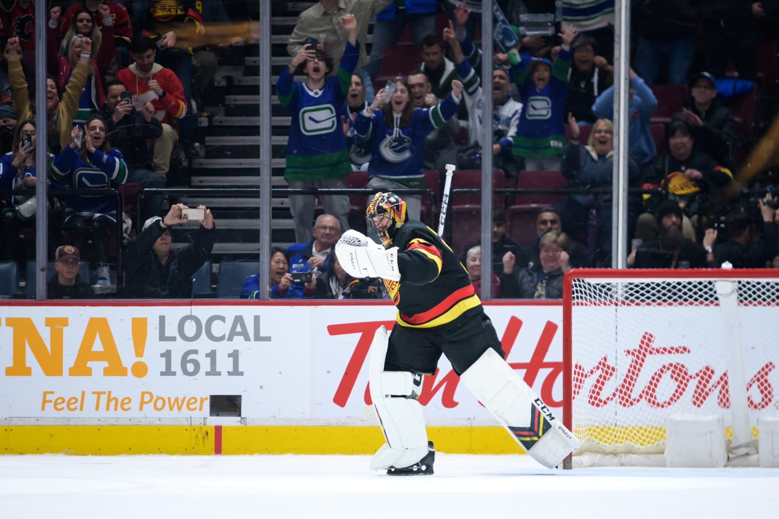 VANCOUVER, CANADA - APRIL 8: Thatcher Demko #35 of the Vancouver Canucks celebrates after defeating the Calgary Flames in a shootout during their NHL game at Rogers Arena on April 8, 2023 in Vancouver, British Columbia, Canada. (Photo by Derek Cain/Getty Images)