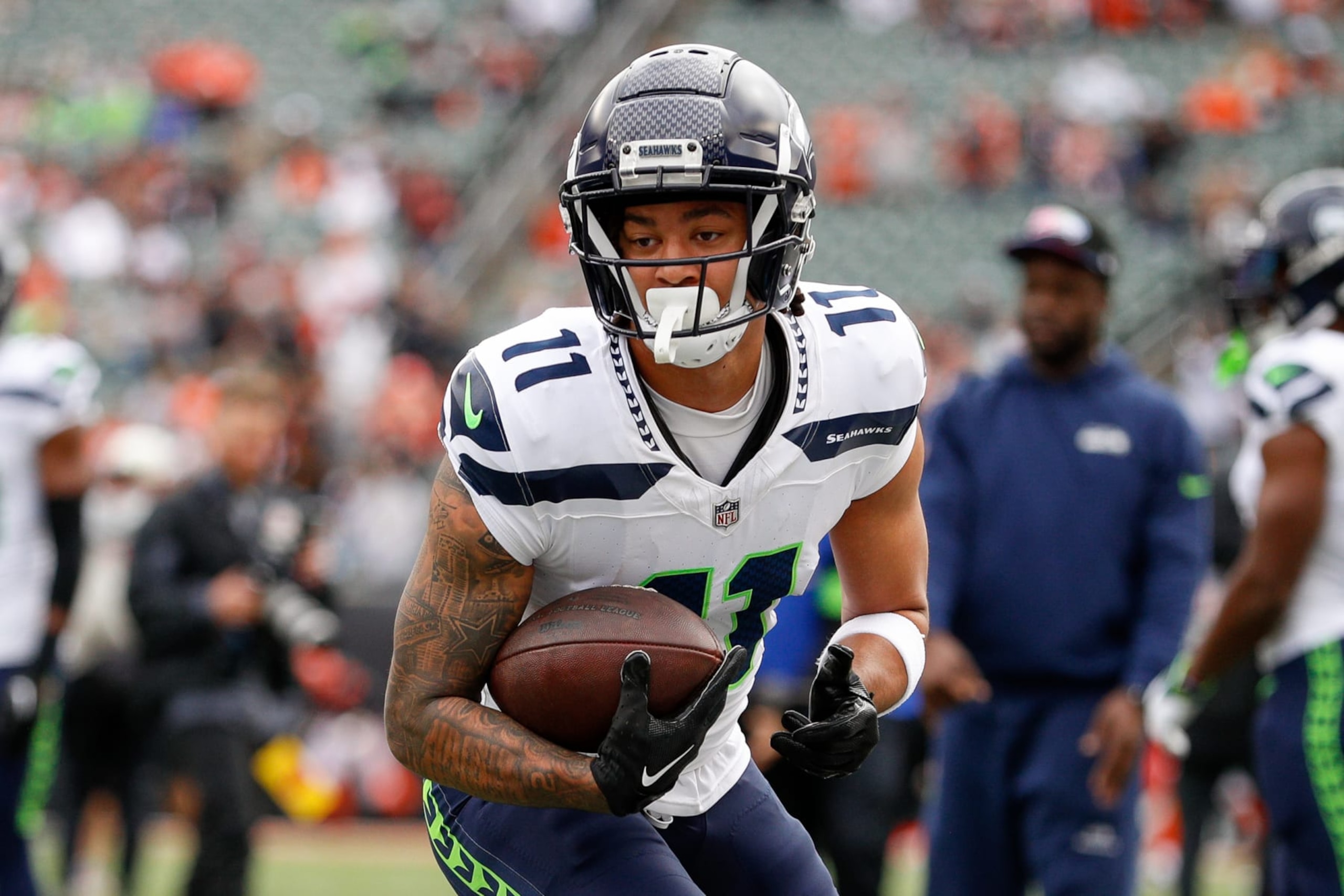 CINCINNATI, OH - OCTOBER 15: Seattle Seahawks wide receiver Jaxon Smith-Njigba (11) warms up before the game against the Seattle Seahawks and the Cincinnati Bengals on October 15, 2023, at Paycor Stadium in Cincinnati, OH. (Photo by Ian Johnson/Icon Sportswire via Getty Images)