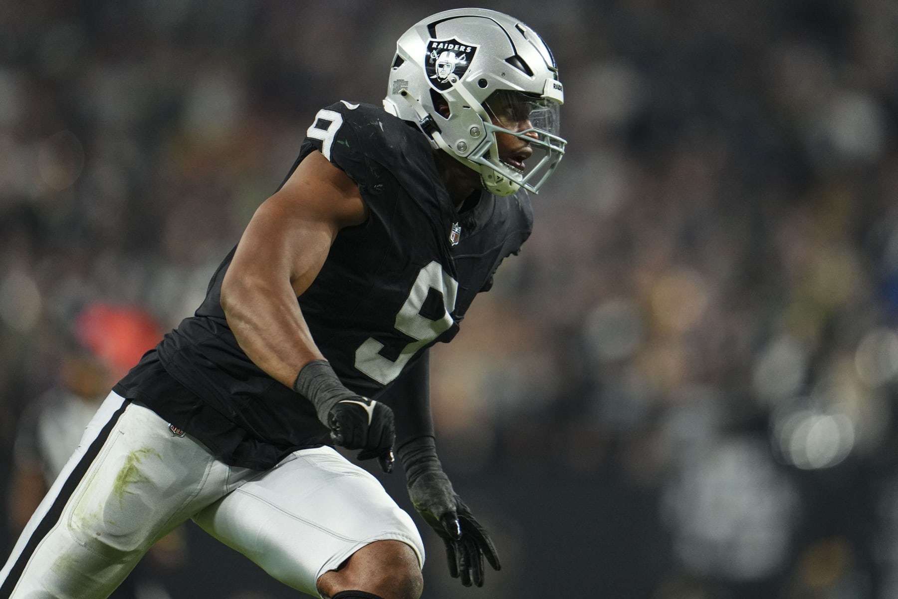 LAS VEGAS, NV - OCTOBER 09: Tyree Wilson #9 of the Las Vegas Raiders rushes the passer during an NFL football game against the Green Bay Packers at Allegiant Stadium on October 9, 2023 in Las Vegas, Nevada. (Photo by Cooper Neill/Getty Images)