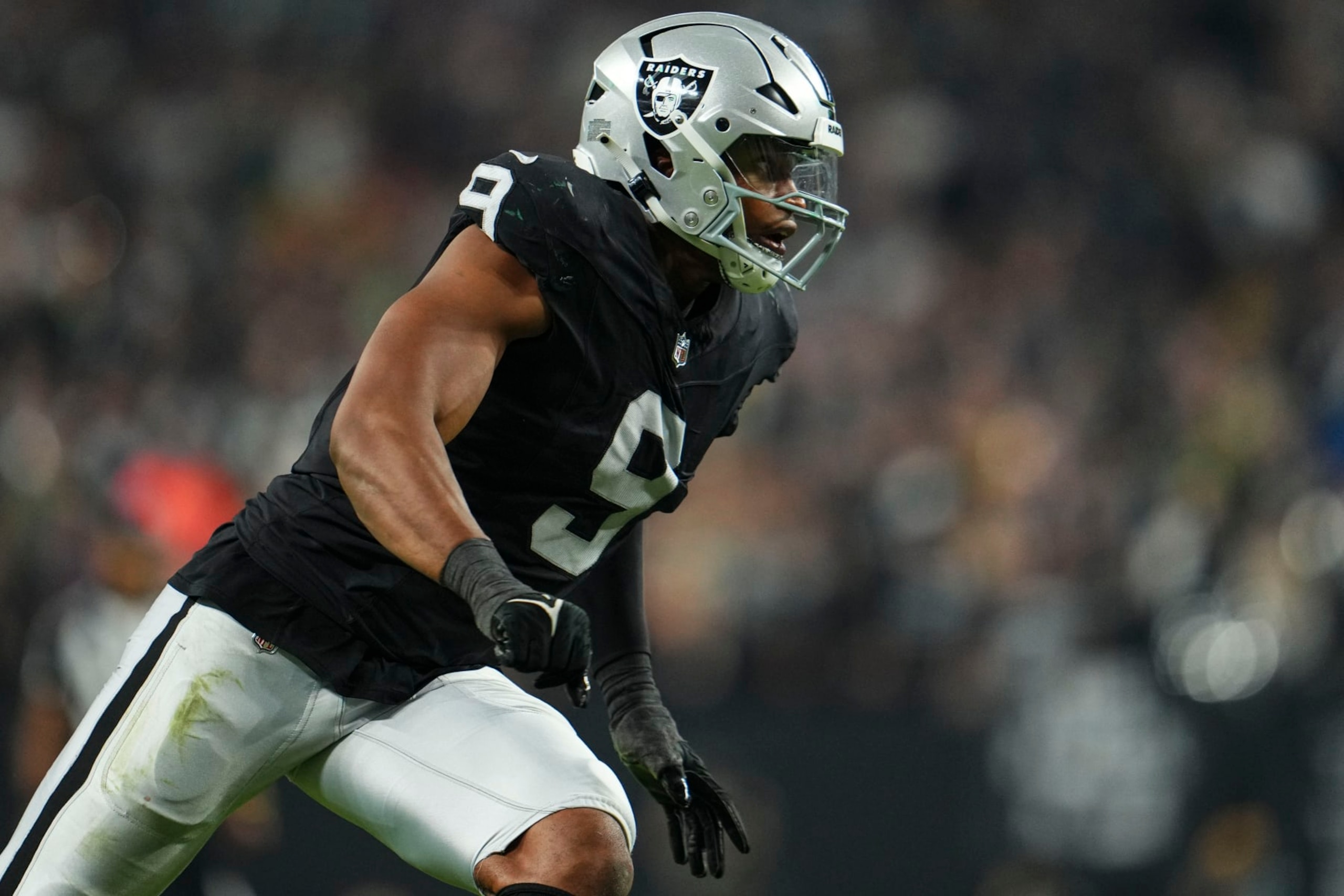 LAS VEGAS, NV - OCTOBER 09: Tyree Wilson #9 of the Las Vegas Raiders rushes the passer during an NFL football game against the Green Bay Packers at Allegiant Stadium on October 9, 2023 in Las Vegas, Nevada. (Photo by Cooper Neill/Getty Images)