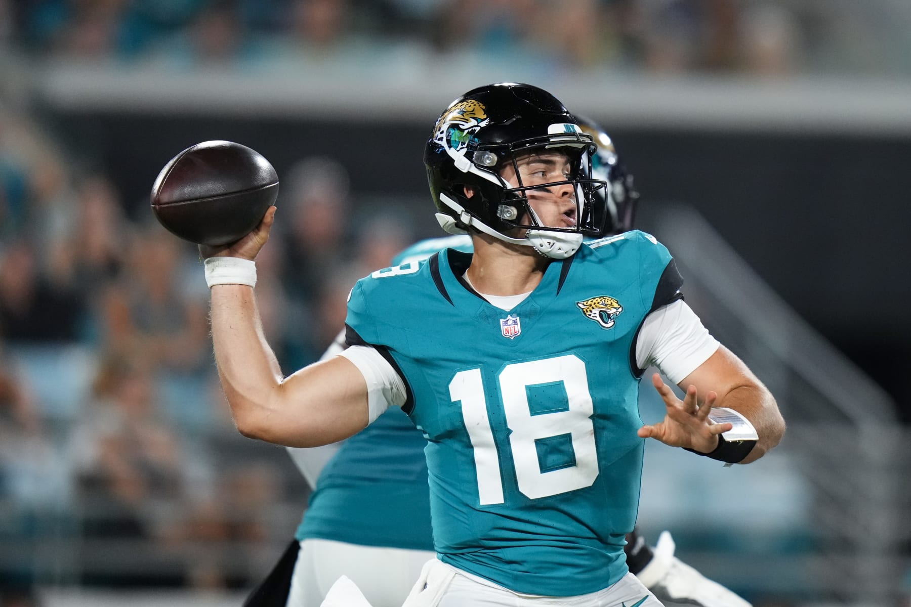 JACKSONVILLE, FLORIDA - AUGUST 26: Nathan Rourke #18 of the Jacksonville Jaguars throws a pass against the Miami Dolphins during the second half at EverBank Stadium on August 26, 2023 in Jacksonville, Florida. (Photo by Rich Storry/Getty Images)