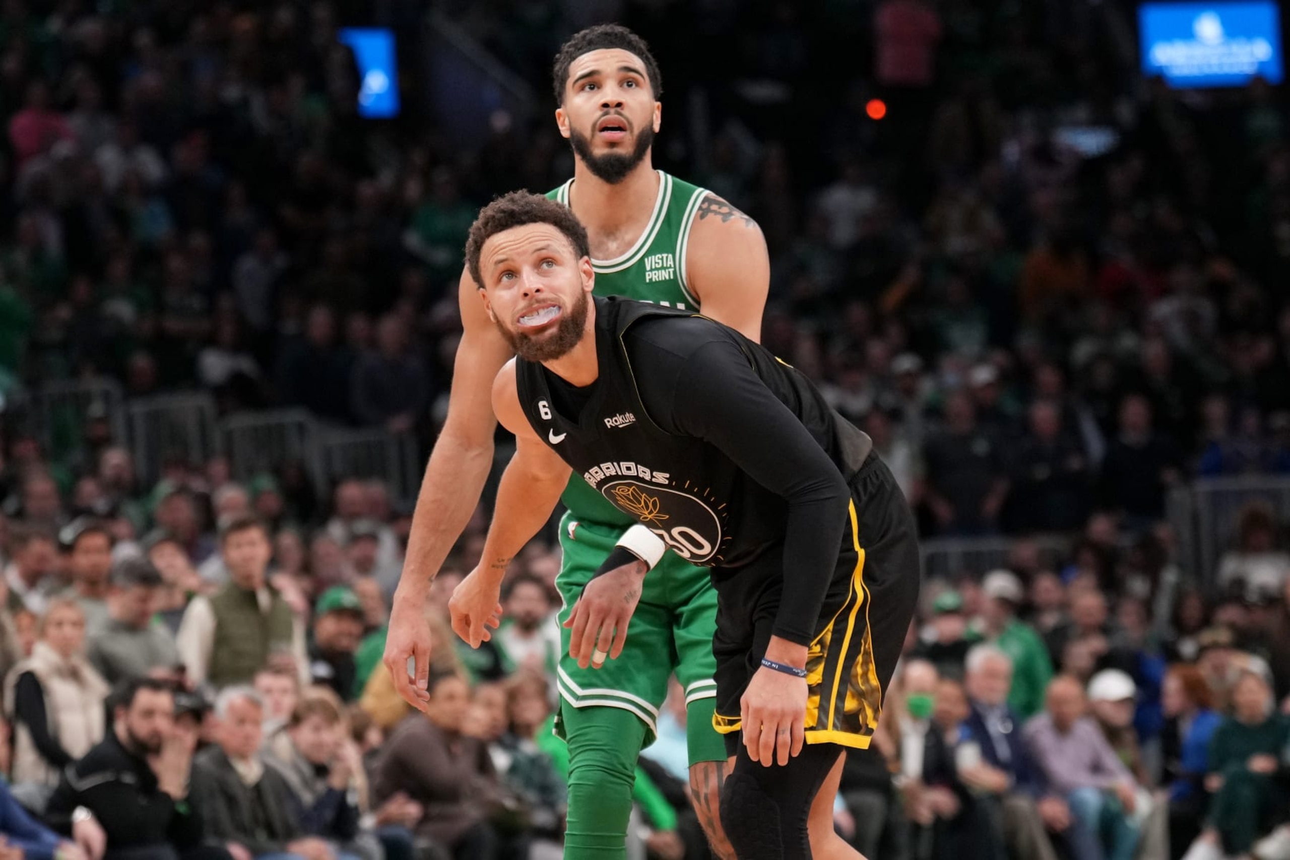 BOSTON, MA - JANUARY 19: Jayson Tatum #0 of the Boston Celtics and Stephen Curry #30 of the Golden State Warriors look on during the game on January 19, 2023 at the TD Garden in Boston, Massachusetts. NOTE TO USER: User expressly acknowledges and agrees that, by downloading and or using this photograph, User is consenting to the terms and conditions of the Getty Images License Agreement. Mandatory Copyright Notice: Copyright 2023 NBAE  (Photo by Jesse D. Garrabrant/NBAE via Getty Images)