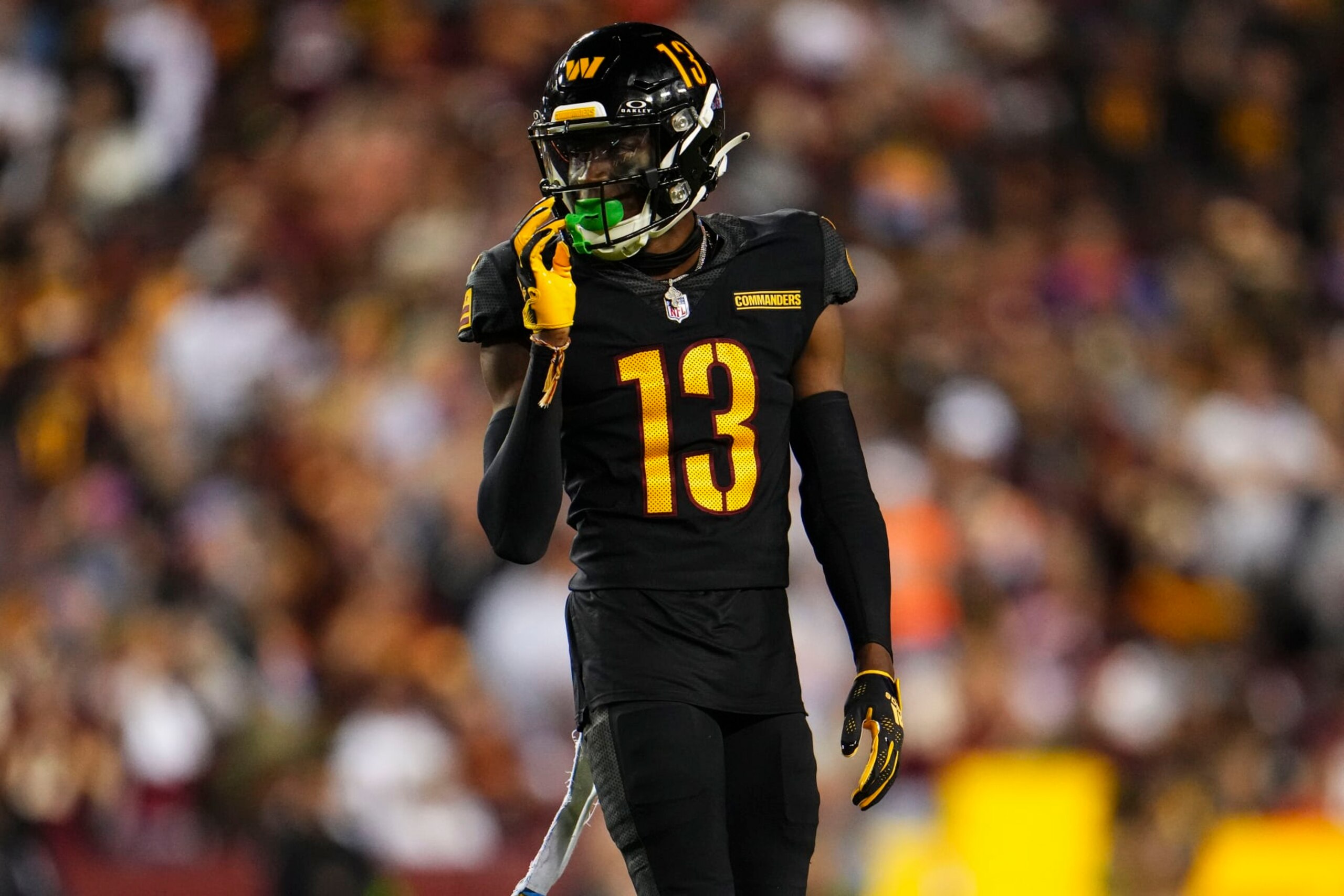 LANDOVER, MD - OCTOBER 05: Emmanuel Forbes #13 of the Washington Commanders looks on from the field during an NFL game against the Chicago Bears at FedEx Field on October 5, 2023 in Landover, Maryland. (Photo by Cooper Neill/Getty Images)
