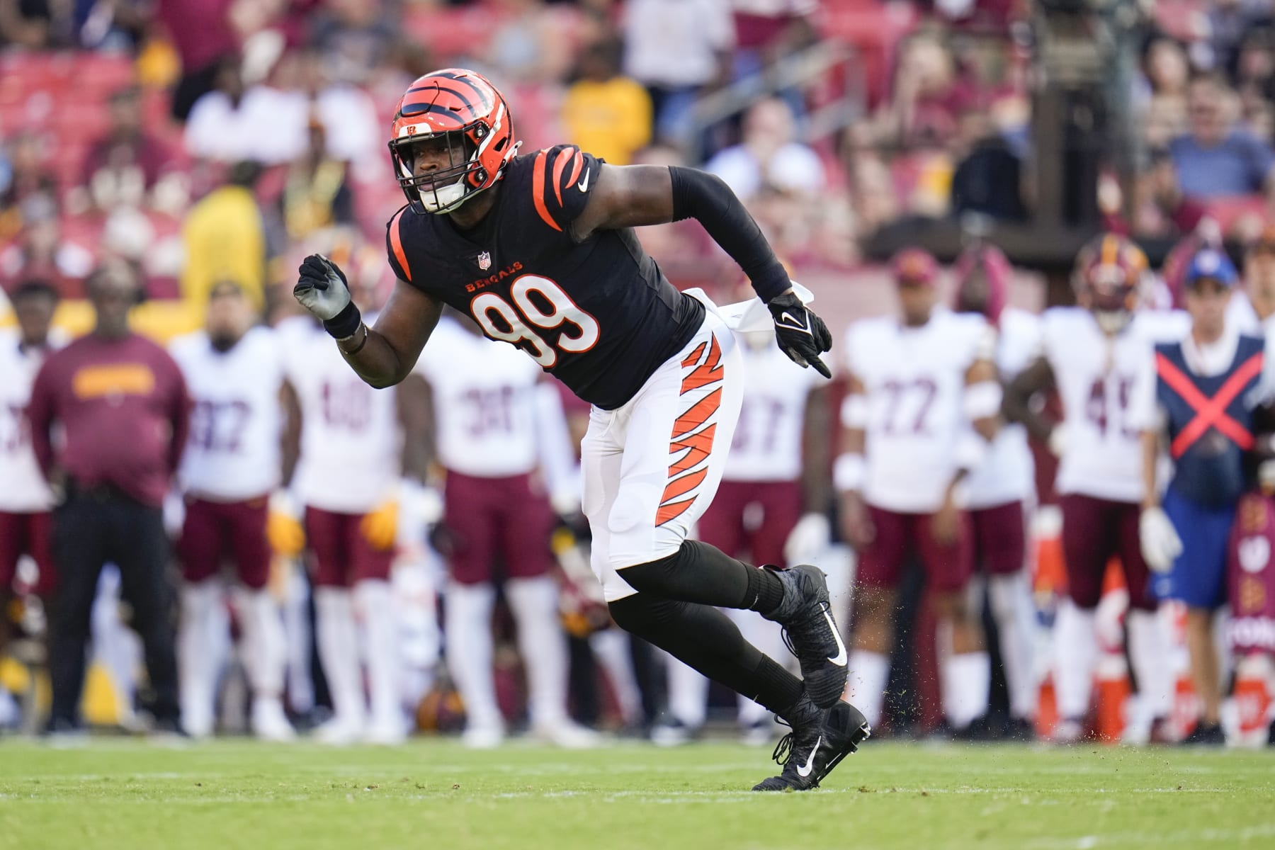 Cincinnati Bengals defensive end Myles Murphy drops back to defend during the first half of an NFL preseason football game between the Cincinnati Bengals and the Washington Commanders, Saturday, Aug. 26, 2023, in Landover, Md. (AP Photo/Julio Cortez)