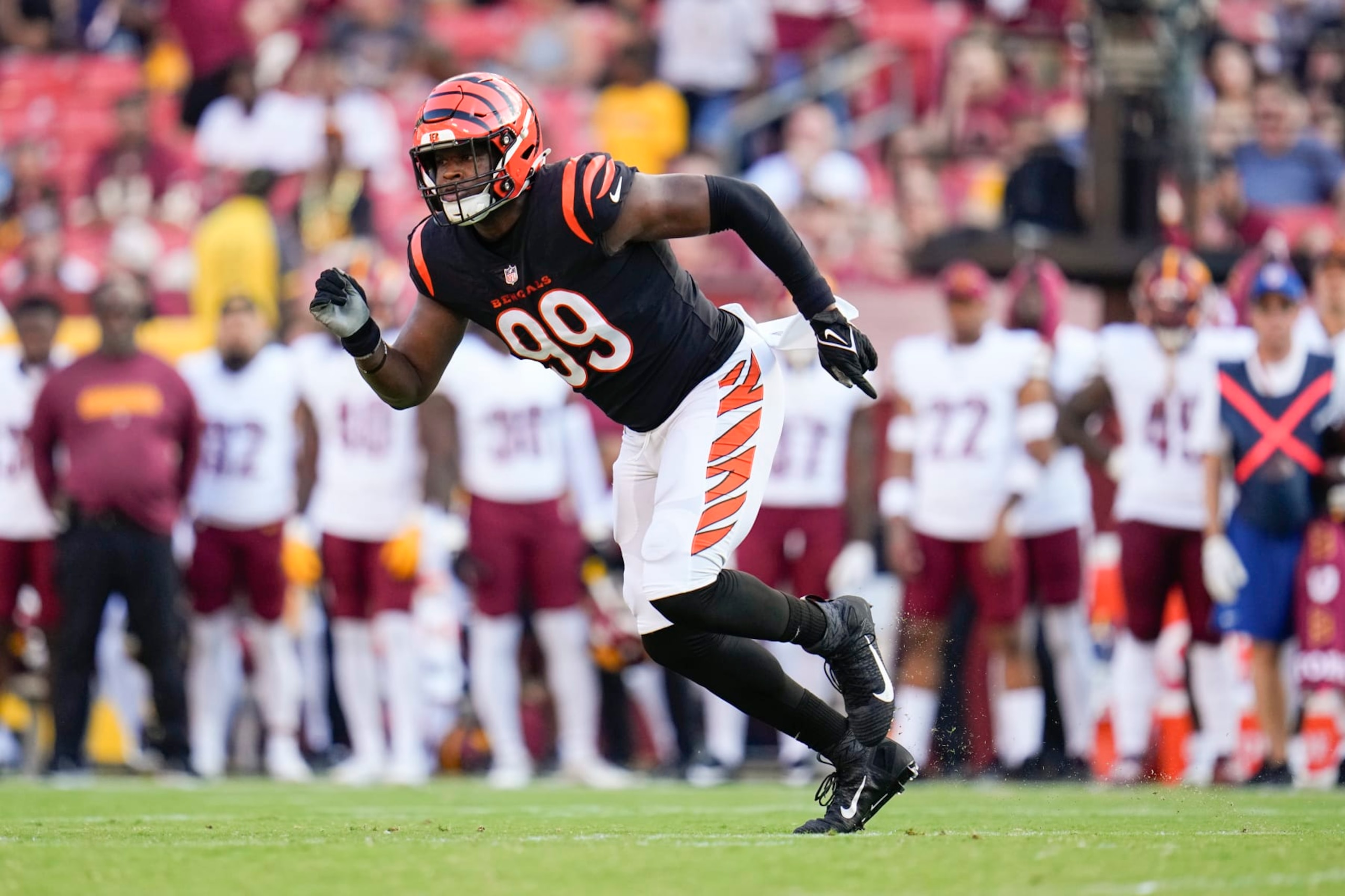 Cincinnati Bengals defensive end Myles Murphy drops back to defend during the first half of an NFL preseason football game between the Cincinnati Bengals and the Washington Commanders, Saturday, Aug. 26, 2023, in Landover, Md. (AP Photo/Julio Cortez)