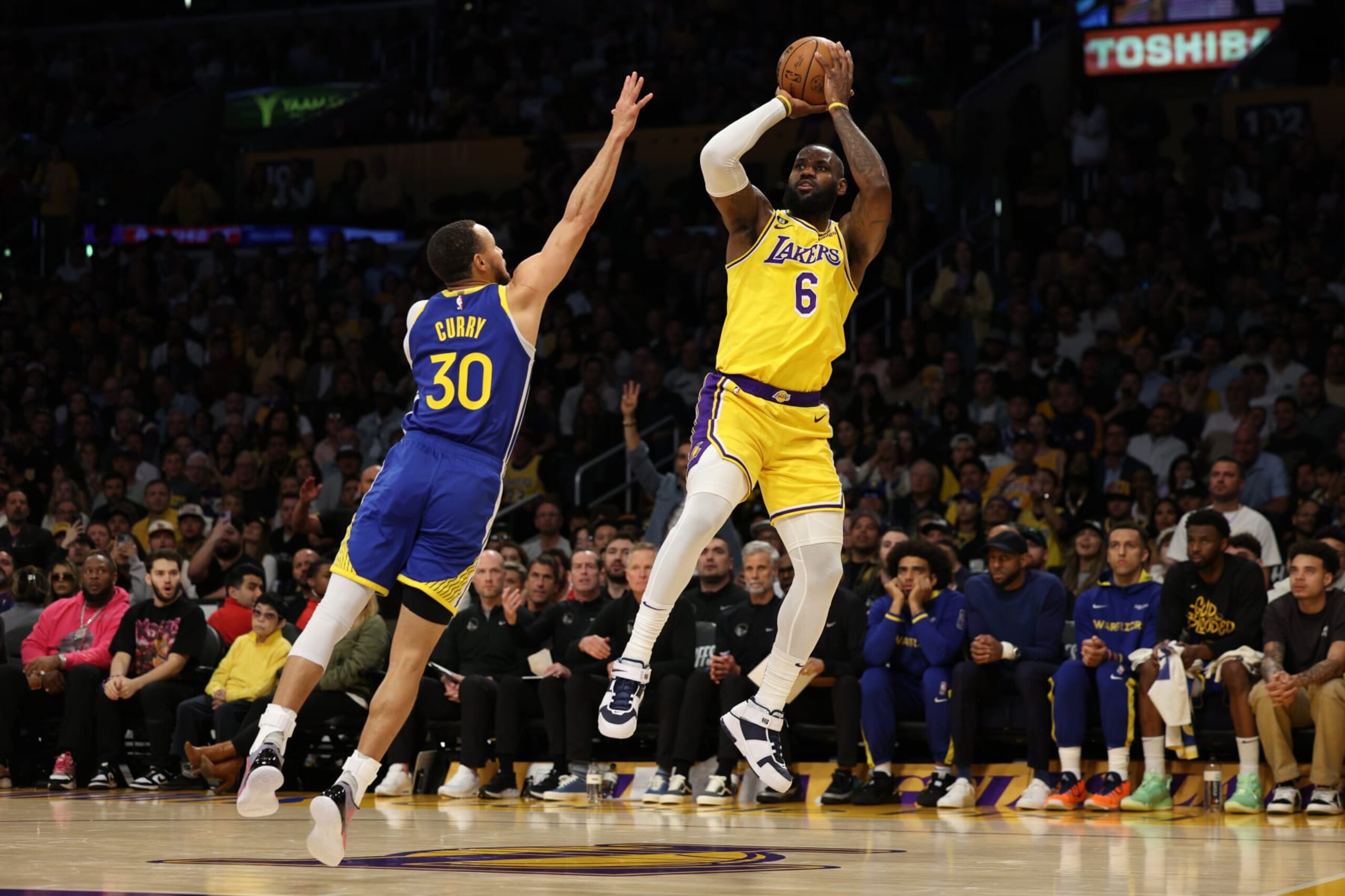 LOS ANGELES, CALIFORNIA - MAY 12: LeBron James #6 of the Los Angeles Lakers shoots the ball over Stephen Curry #30 of the Golden State Warriors during the first quarter in game six of the Western Conference Semifinal Playoffs at Crypto.com Arena on May 12, 2023 in Los Angeles, California. NOTE TO USER: User expressly acknowledges and agrees that, by downloading and or using this photograph, User is consenting to the terms and conditions of the Getty Images License Agreement. (Photo by Harry How/Getty Images)