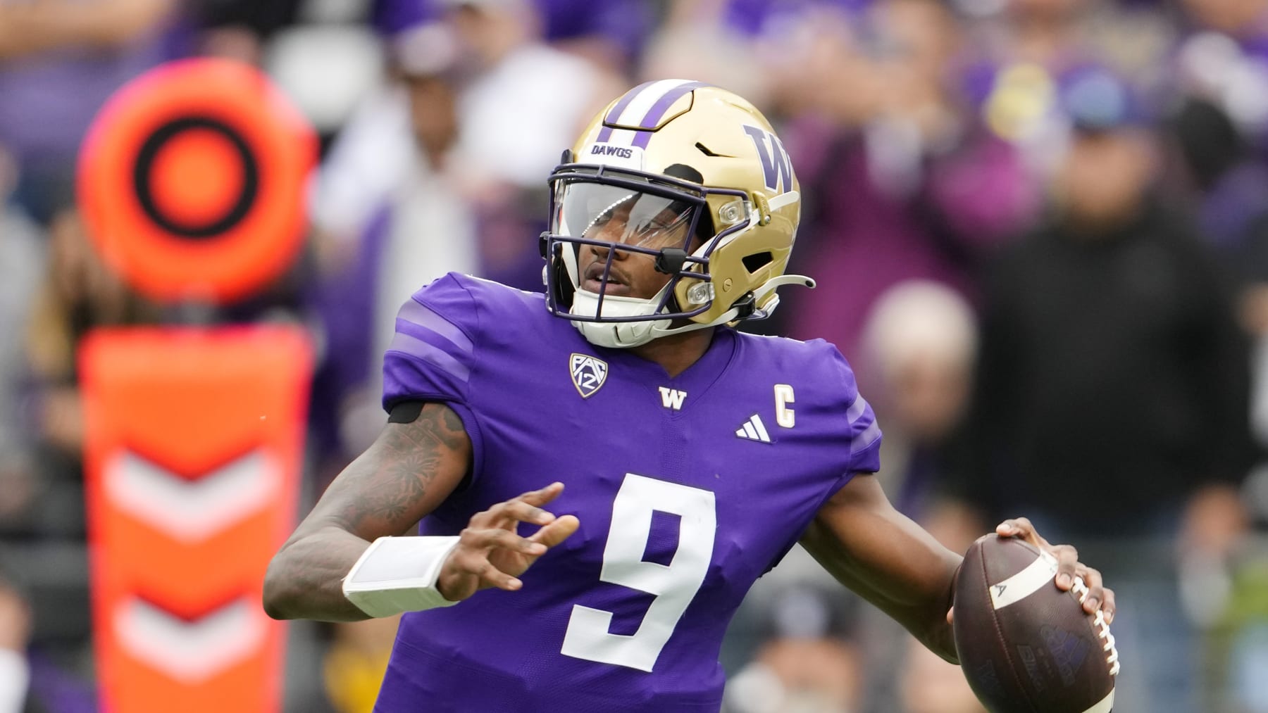 Washington quarterback Michael Penix Jr. looks to throw against Oregon during the second half of an NCAA college football game, Saturday, Oct. 14, 2023, in Seattle. Washington won 36-33. (AP Photo/Lindsey Wasson)