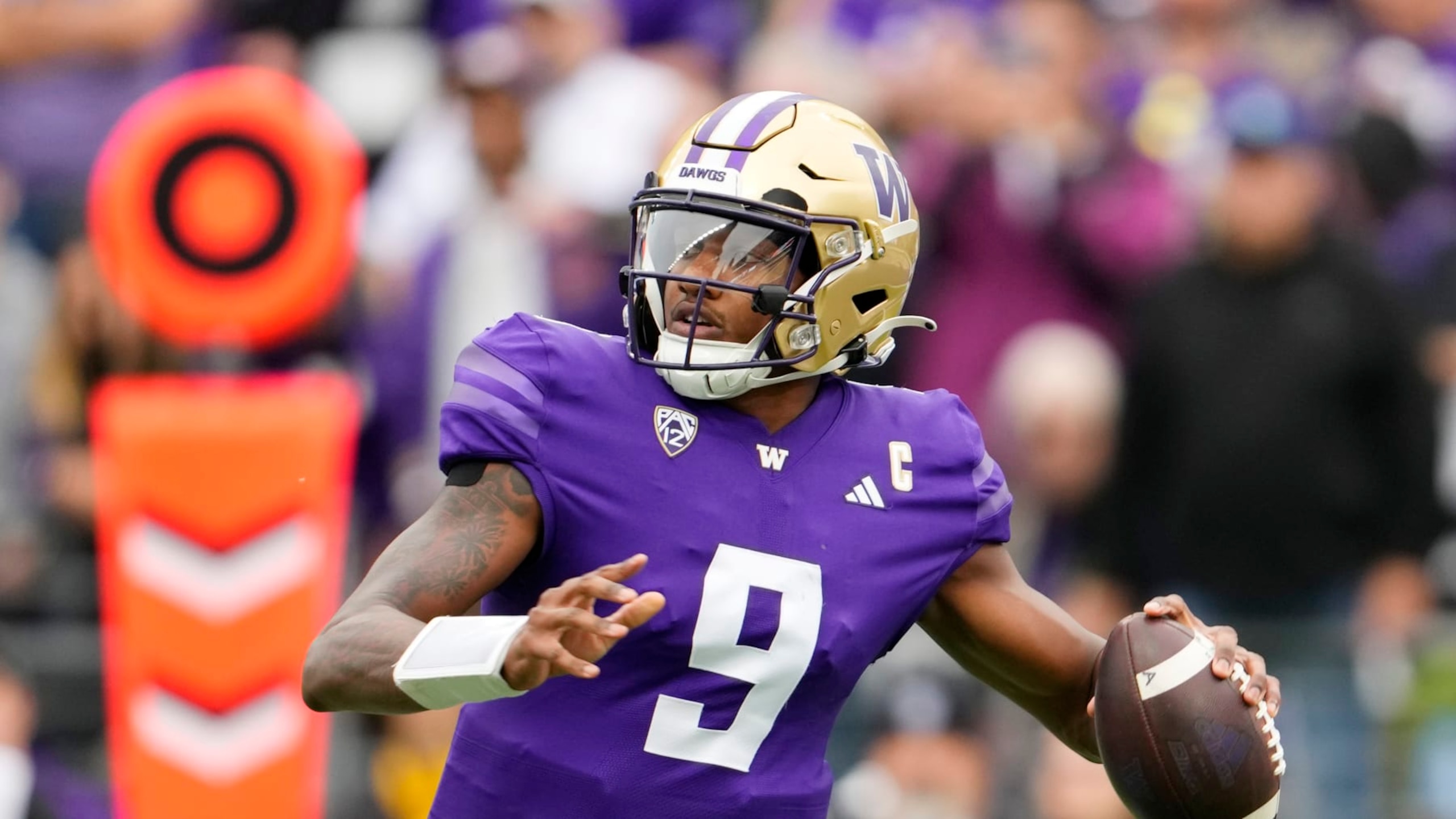 Washington quarterback Michael Penix Jr. looks to throw against Oregon during the second half of an NCAA college football game, Saturday, Oct. 14, 2023, in Seattle. Washington won 36-33. (AP Photo/Lindsey Wasson)