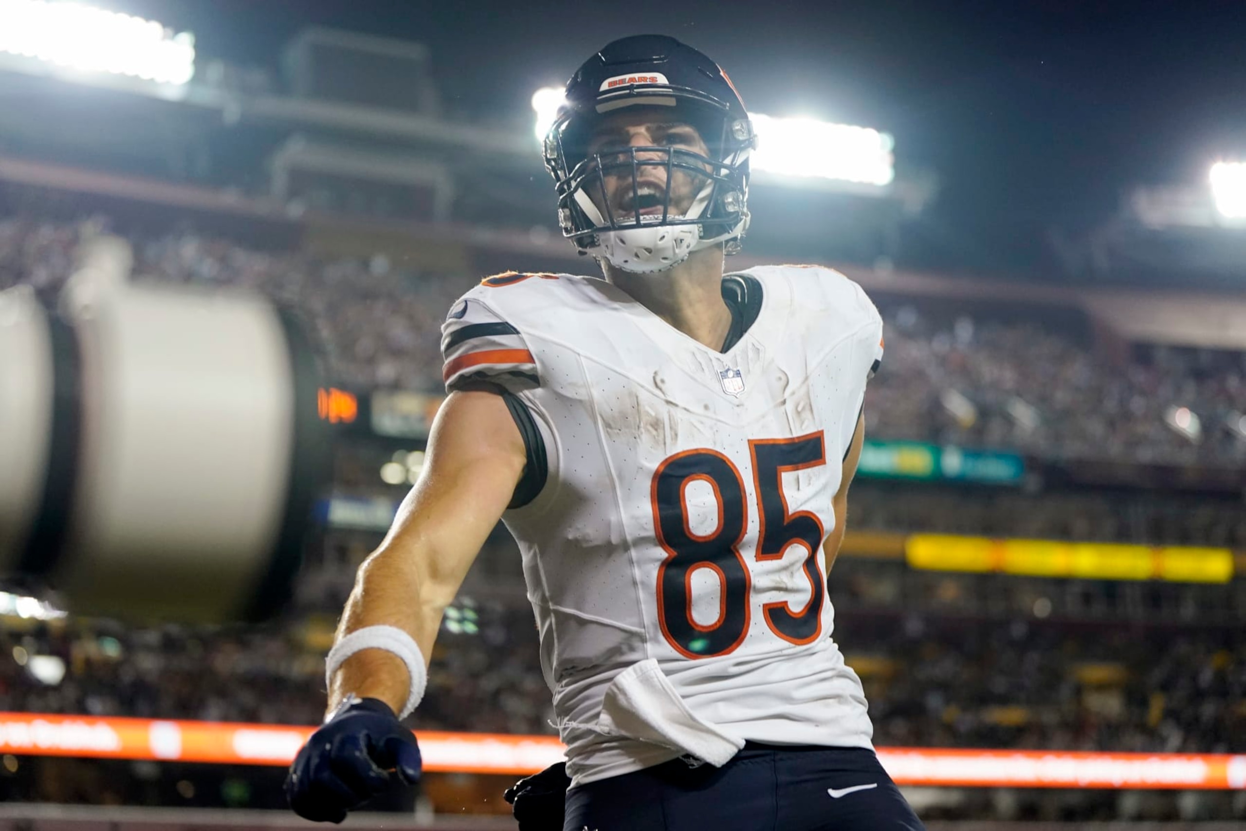 LANDOVER, MARYLAND - OCTOBER 05: Cole Kmet #85 of the Chicago Bears celebrates after catching for a touchdown against the Washington Commanders during the second quarter at FedExField on October 05, 2023 in Landover, Maryland. (Photo by Jess Rapfogel/Getty Images)
