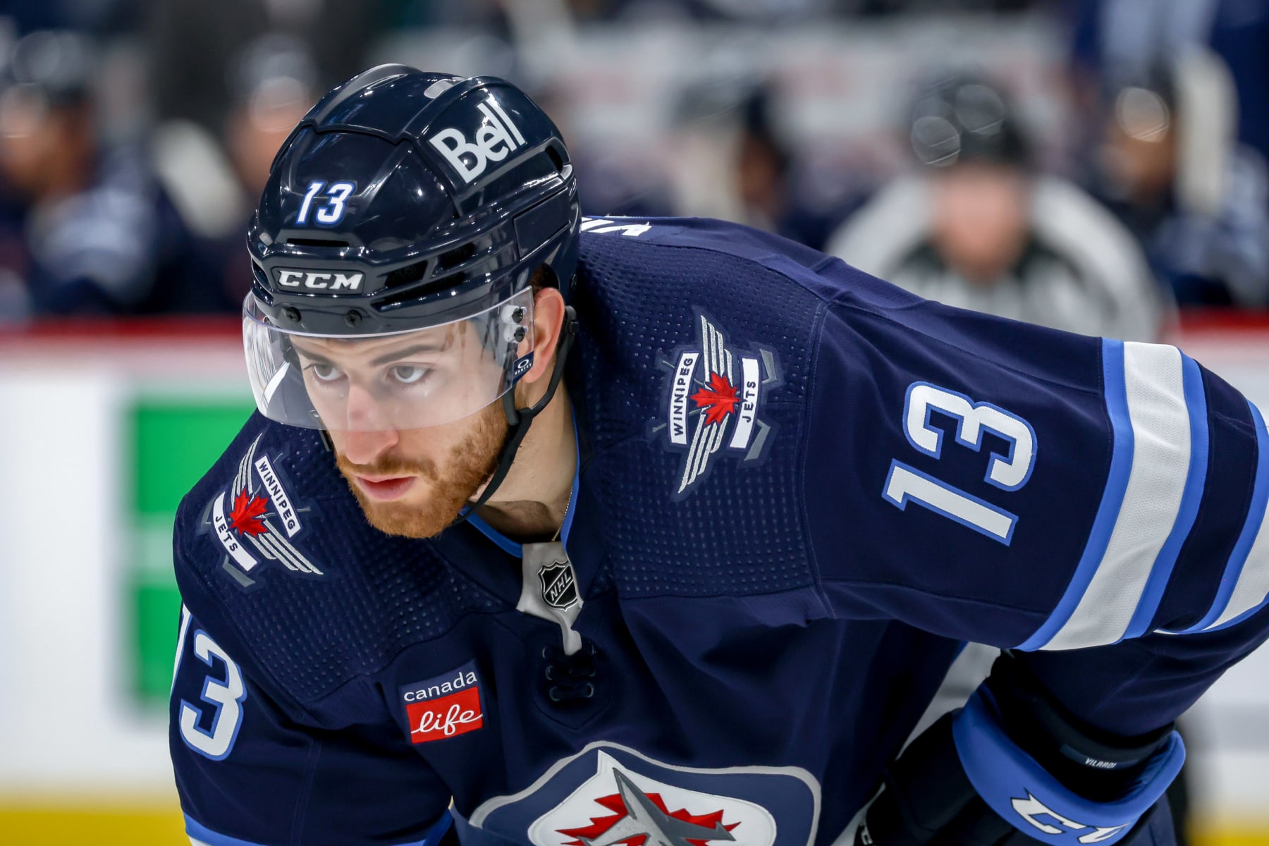 WINNIPEG, CANADA - OCTOBER 14: Gabriel Vilardi #13 of the Winnipeg Jets gets set during a second period face-off against the Florida Panthers at the Canada Life Centre on October 14, 2023 in Winnipeg, Manitoba, Canada. (Photo by Jonathan Kozub/NHLI via Getty Images)