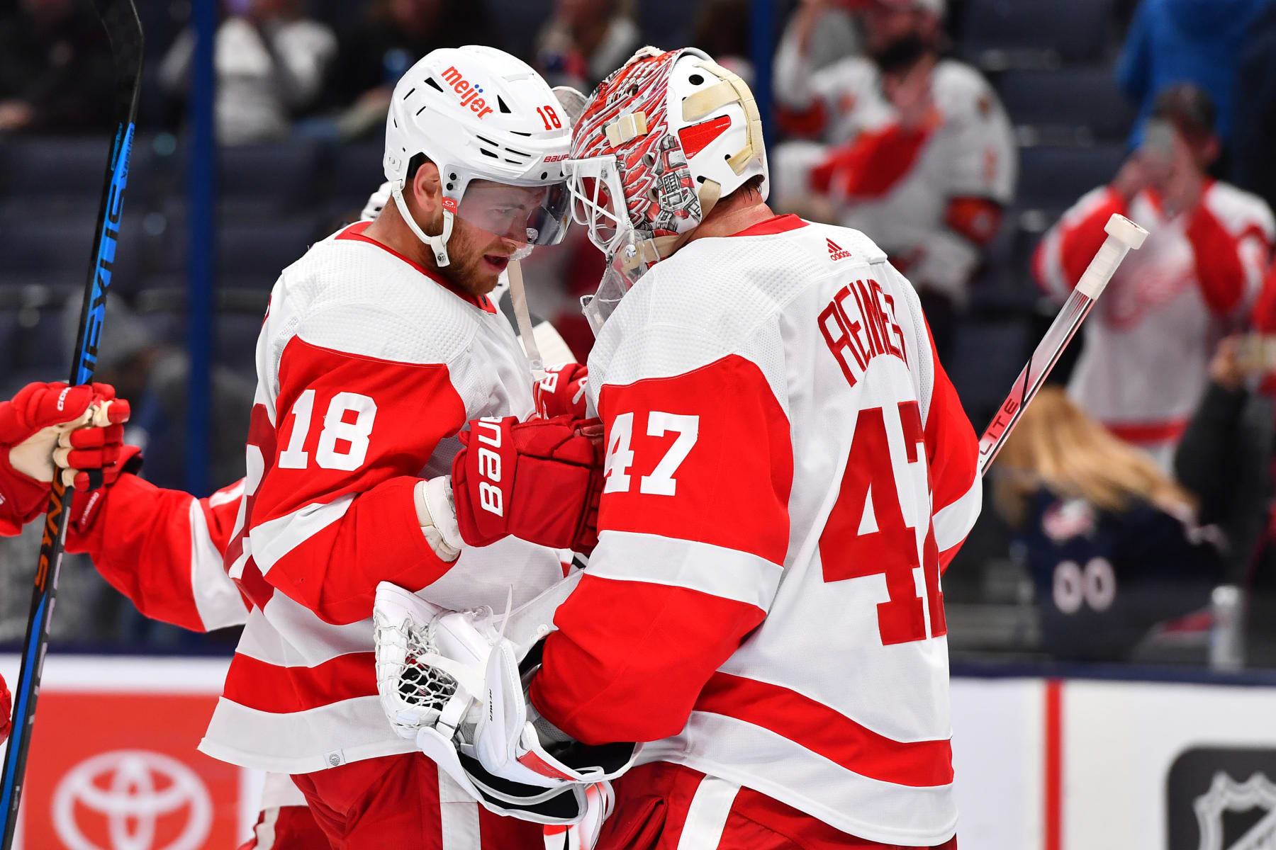 COLUMBUS, OHIO - OCTOBER 16: Goaltender James Reimer #47 of the Detroit Red Wings celebrates with teammate Andrew Copp #18 of the Detroit Red Wings after shutting out the Columbus Blue Jackets 4-0 in a game at Nationwide Arena on October 16, 2023 in Columbus, Ohio. (Photo by Ben Jackson/NHLI via Getty Images)