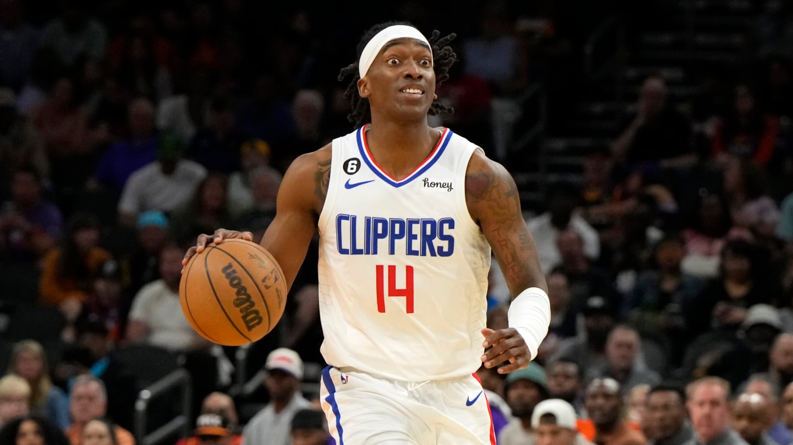 LA Clippers guard Terance Mann (14) during the first half of an NBA basketball game against the Phoenix Suns, Sunday, April 9, 2023, in Phoenix. (AP Photo/Rick Scuteri)