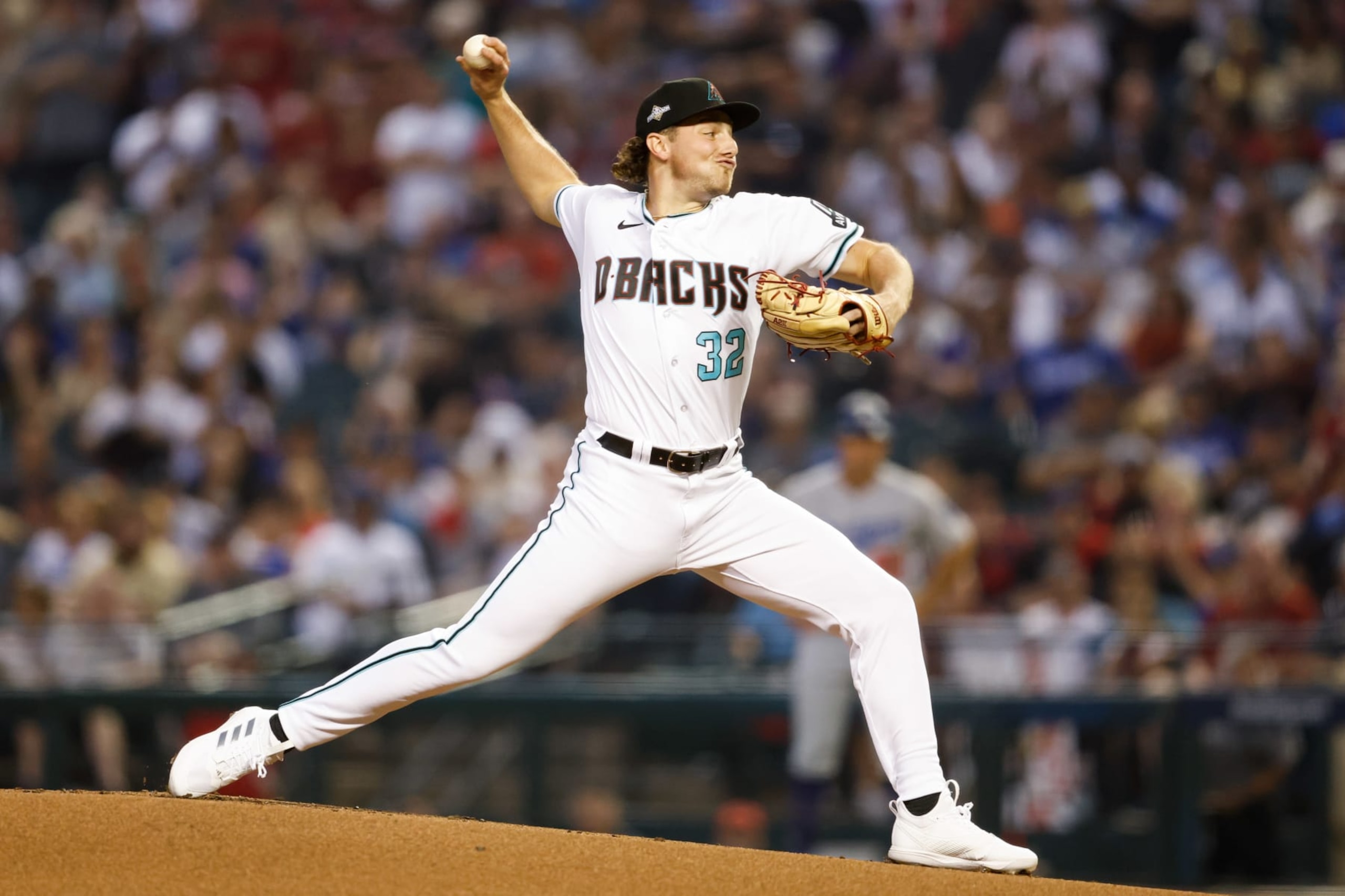 PHOENIX, AZ - OCTOBER 11:   Brandon Pfaadt #32 of the Arizona Diamondbacks pitches during Game 3 of the Division Series between the Los Angeles Dodgers and the Arizona Diamondbacks at Chase Field on Wednesday, October 11, 2023 in Phoenix, Arizona. (Photo by Chris Coduto/MLB Photos via Getty Images)