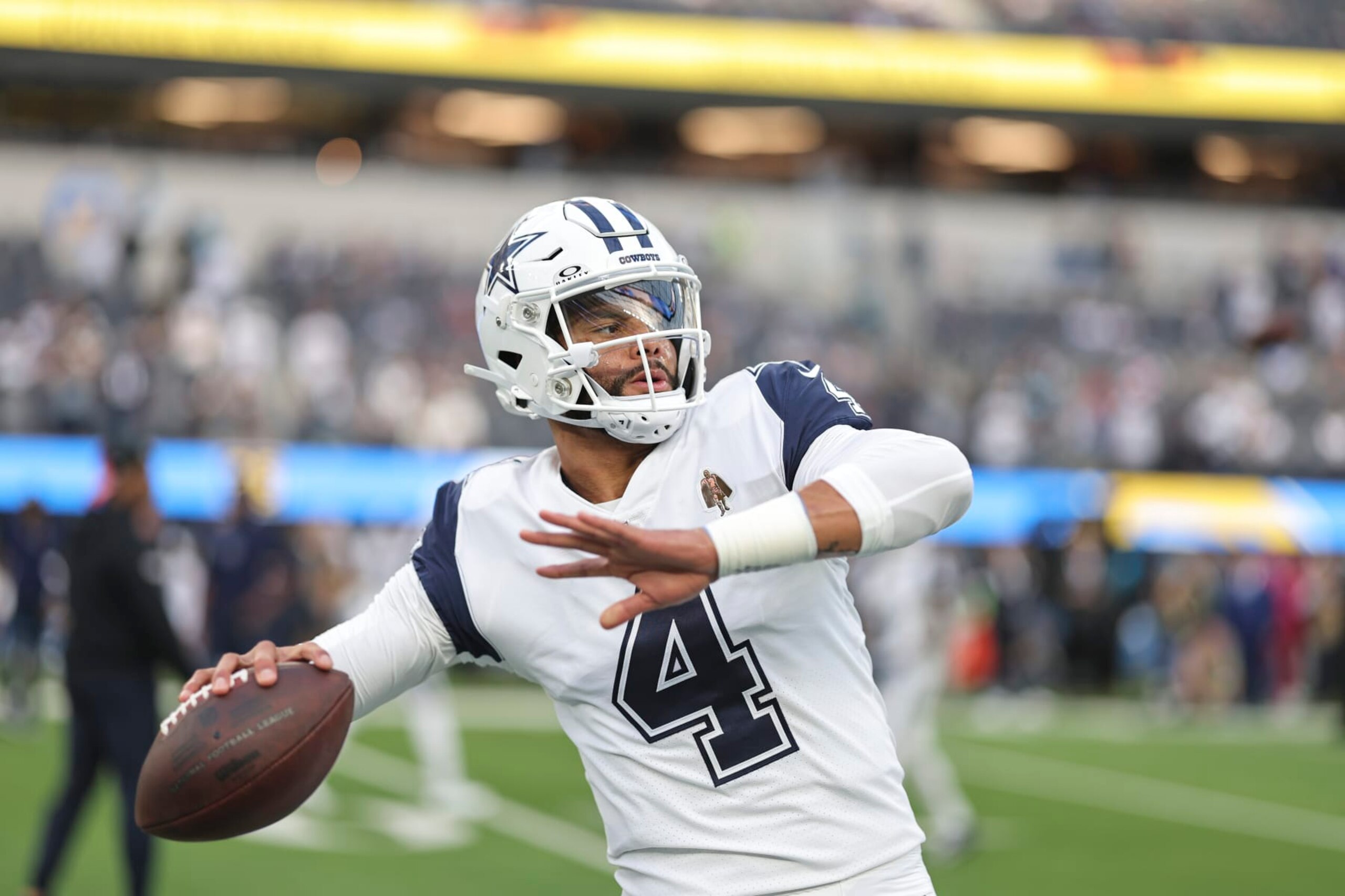 INGLEWOOD, CALIFORNIA - OCTOBER 16: Dak Prescott #4 of the Dallas Cowboys passes as he warms up prior to an NFL football game between the Los Angeles Chargers and the Dallas Cowboys at SoFi Stadium on October 16, 2023 in Inglewood, California. (Photo by Michael Owens/Getty Images) INGLEWOOD, CALIFORNIA - OCTOBER 16: Dak Prescott #4 of the Dallas Cowboys passes as he warms up prior to an NFL football game between the Los Angeles Chargers and the Dallas Cowboys at SoFi Stadium on October 16, 2023 in Inglewood, California. (Photo by Michael Owens/Getty Images)