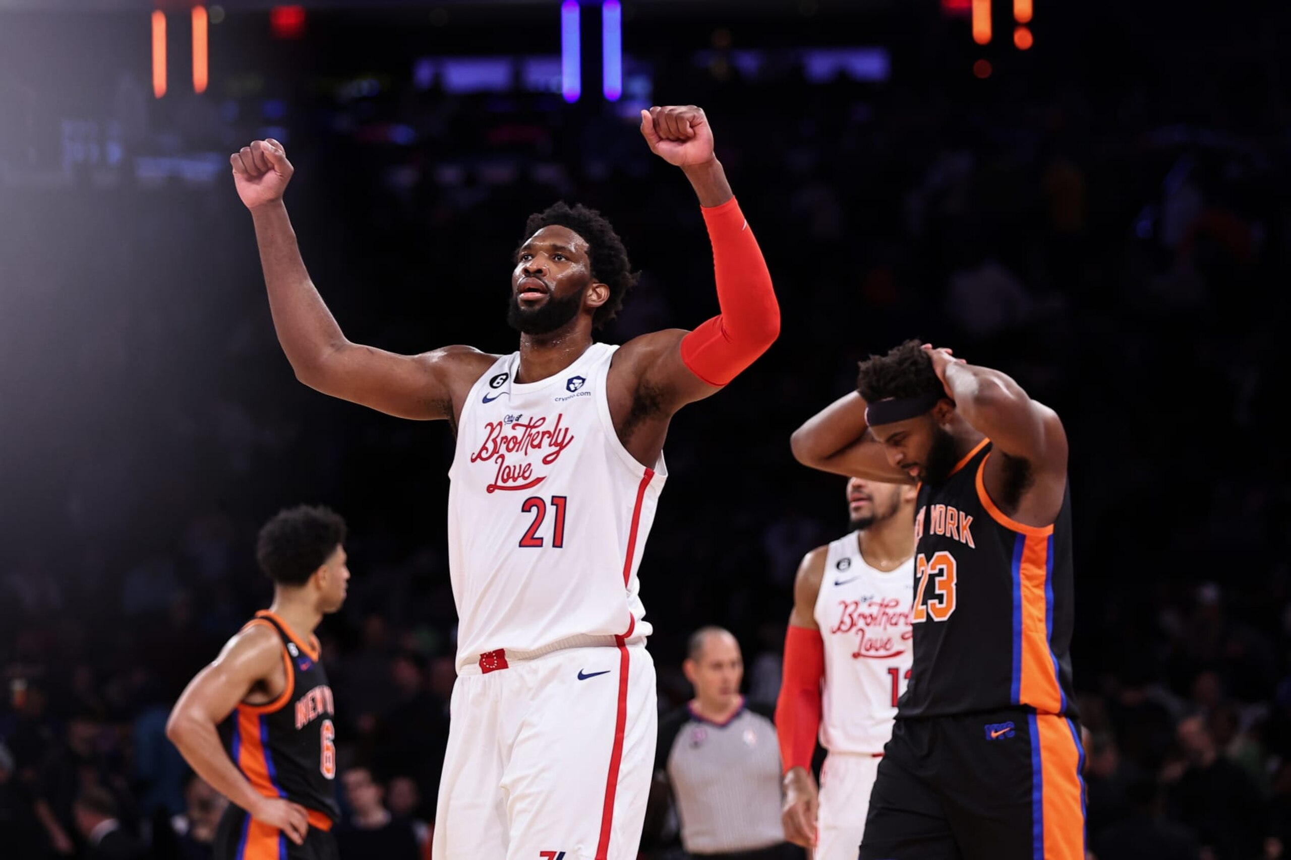 NEW YORK, NEW YORK - DECEMBER 25: Joel Embiid #21 of the Philadelphia 76ers reacts during the fourth quarter of the game against the New York Knicks at Madison Square Garden on December 25, 2022 in New York City.  NOTE TO USER: User expressly acknowledges and agrees that, by downloading and or using this photograph, User is consenting to the terms and conditions of the Getty Images License Agreement. (Photo by Dustin Satloff/Getty Images)