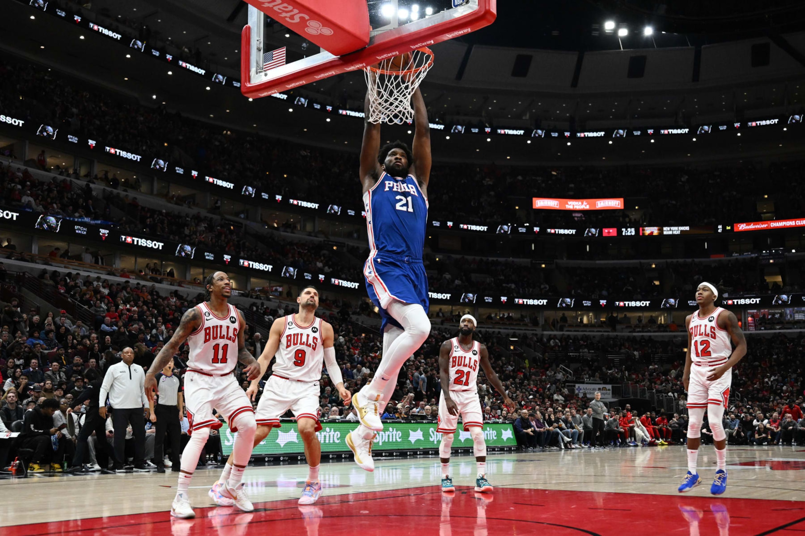 CHICAGO, ILLINOIS - MARCH 22: Joel Embiid #21 of the Philadelphia 76ers dunks in the first half against the Chicago Bulls at United Center on March 22, 2023 in Chicago, Illinois.  NOTE TO USER: User expressly acknowledges and agrees that, by downloading and or using this photograph, User is consenting to the terms and conditions of the Getty Images License Agreement.  (Photo by Quinn Harris/Getty Images)