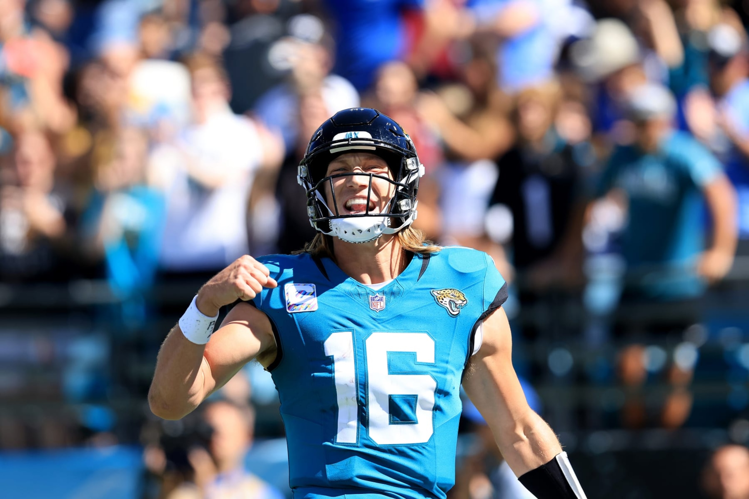 JACKSONVILLE, FLORIDA - OCTOBER 15: Trevor Lawrence #16 of the Jacksonville Jaguars celebrates a touchdown during the game against the Indianapolis Colts at EverBank Stadium on October 15, 2023 in Jacksonville, Florida. (Photo by Sam Greenwood/Getty Images)