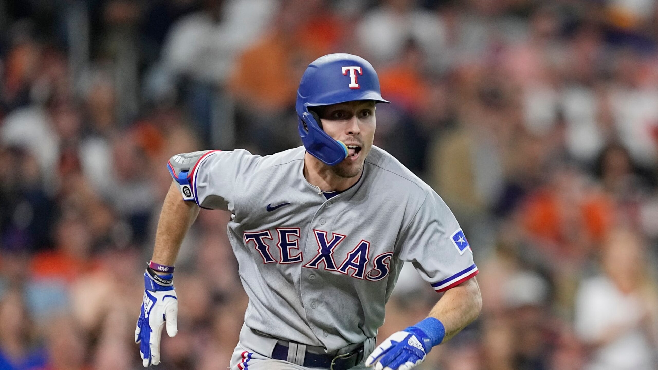 Texas Rangers' Evan Carter during the ninth inning of Game 2 of the baseball AL Championship Series against the Houston Astros Monday, Oct. 16, 2023, in Houston. (AP Photo/David J. Phillip)