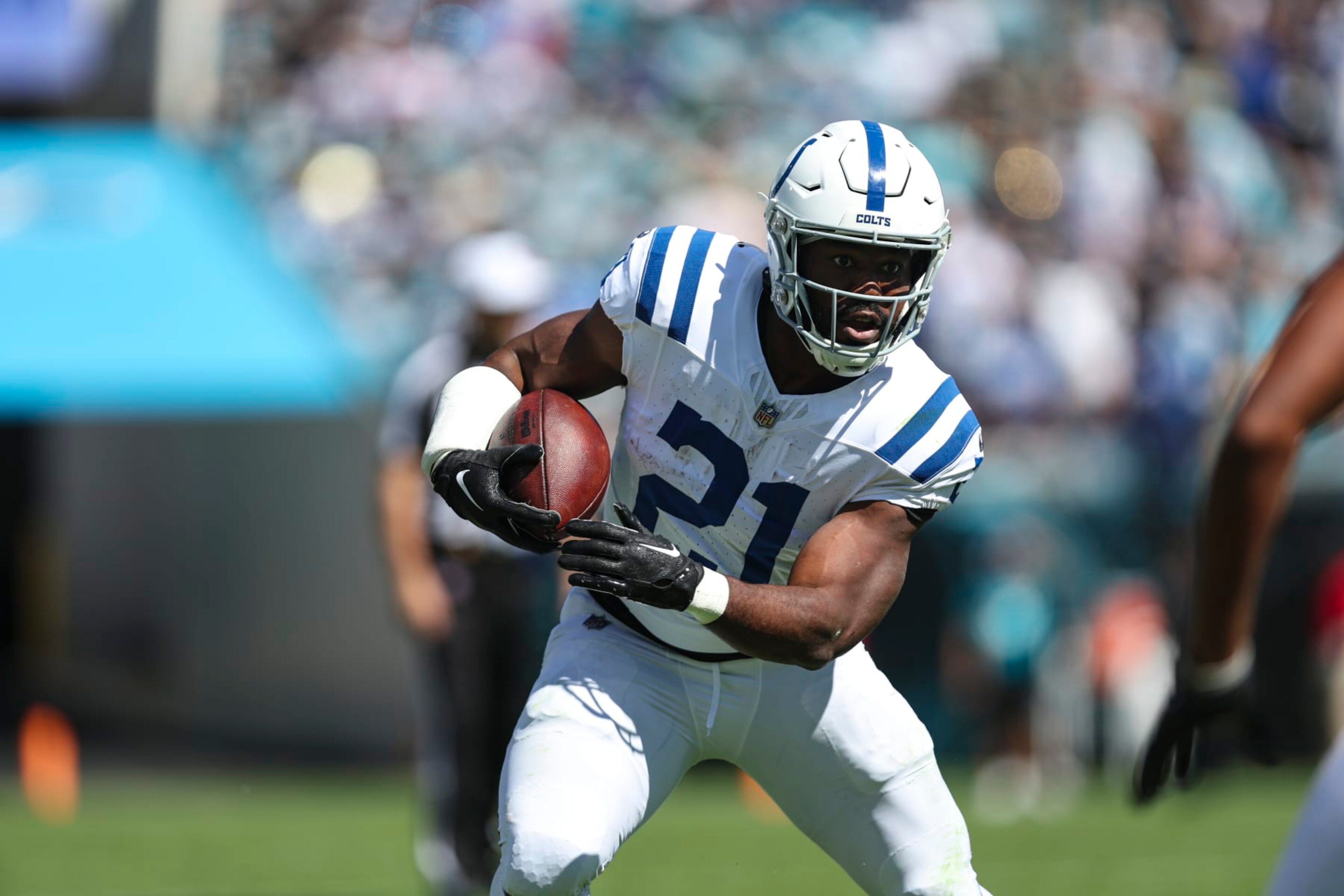 JACKSONVILLE, FL - OCTOBER 15: Zack Moss #21 of the Indianapolis Colts runs the ball during an NFL game against the Jacksonville Jaguars at EverBank Field on October 15, 2023 in Jacksonville, Florida. (Photo by Perry Knotts/Getty Images)