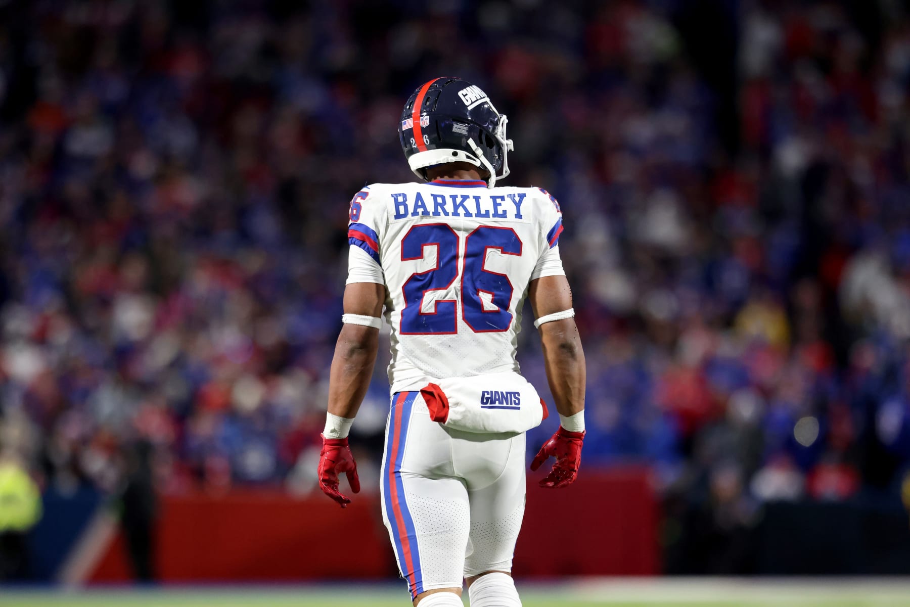 ORCHARD PARK, NEW YORK - OCTOBER 15: Saquon Barkley #26 of the New York Giants looks on during the fourth quarter against the Buffalo Bills at Highmark Stadium on October 15, 2023 in Orchard Park, New York. (Photo by Bryan Bennett/Getty Images)