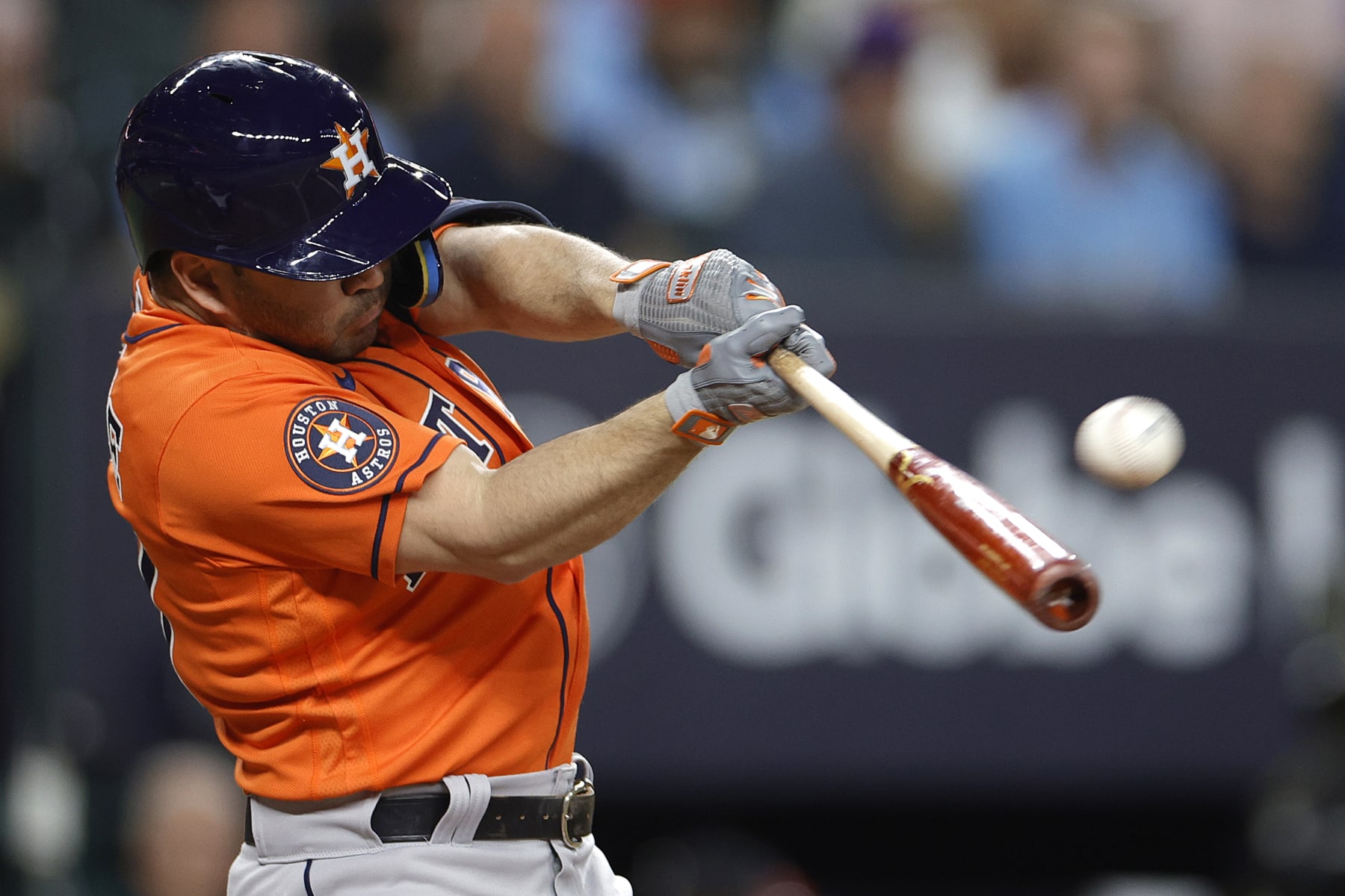 ARLINGTON, TEXAS - OCTOBER 18: Jose Altuve #27 of the Houston Astros hits a solo home run against Max Scherzer #31 of the Texas Rangers during the third inning in Game Three of the American League Championship Series at Globe Life Field on October 18, 2023 in Arlington, Texas. (Photo by Carmen Mandato/Getty Images)