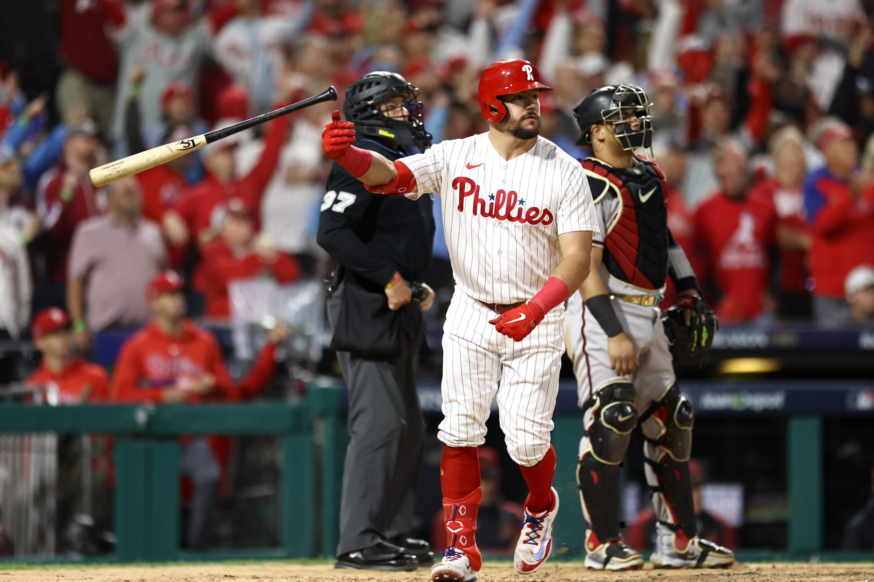 PHILADELPHIA, PENNSYLVANIA - OCTOBER 17: Kyle Schwarber #12 of the Philadelphia Phillies reacts after his sixth inning solo home run against the Arizona Diamondbacks during Game Two of the Championship Series at Citizens Bank Park on October 17, 2023 in Philadelphia, Pennsylvania. (Photo by Tim Nwachukwu/Getty Images)
