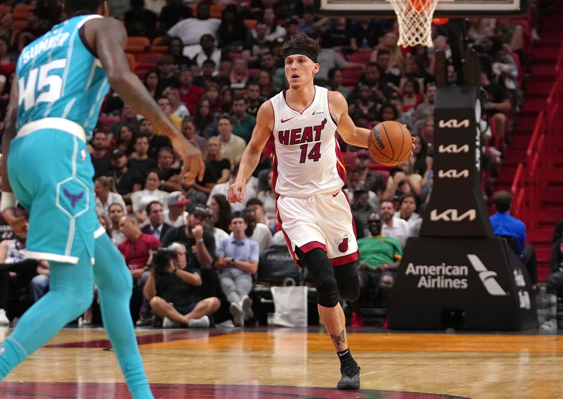 MIAMI, FL - OCTOBER 10: Tyler Herro #14 of the Miami Heat brings the ball up court against the Charlotte Hornets on October 10, 2023 at Kaseya Center in Miami, Florida. NOTE TO USER: User expressly acknowledges and agrees that, by downloading and or using this Photograph, user is consenting to the terms and conditions of the Getty Images License Agreement. Mandatory Copyright Notice: Copyright 2023 NBAE (Photo by Eric Espada/NBAE via Getty Images)