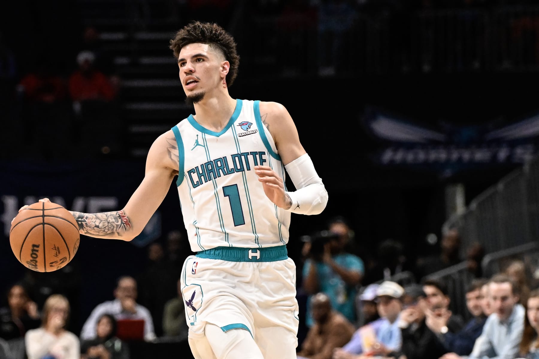 CHARLOTTE, NORTH CAROLINA - OCTOBER 15: LaMelo Ball #1 of the Charlotte Hornets brings the ball upcourt during the second quarter of his game against the Oklahoma City Thunder at Spectrum Center on October 15, 2023 in Charlotte, North Carolina. NOTE TO USER: User expressly acknowledges and agrees that, by downloading and or using this photograph, User is consenting to the terms and conditions of the Getty Images License Agreement.  (Photo by Matt Kelley/Getty Images)