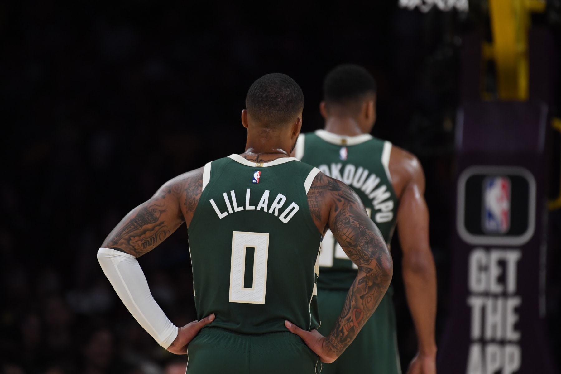 LOS ANGELES, CA - OCTOBER 15: Damian Lillard #0 and Giannis Antetokounmpo #34 of the Milwaukee Bucks look on during the preseason game on October 15, 2023 at Crypto.Com Arena in Los Angeles, California. NOTE TO USER: User expressly acknowledges and agrees that, by downloading and/or using this Photograph, user is consenting to the terms and conditions of the Getty Images License Agreement. Mandatory Copyright Notice: Copyright 2023 NBAE (Photo by Juan Ocampo/NBAE via Getty Images)