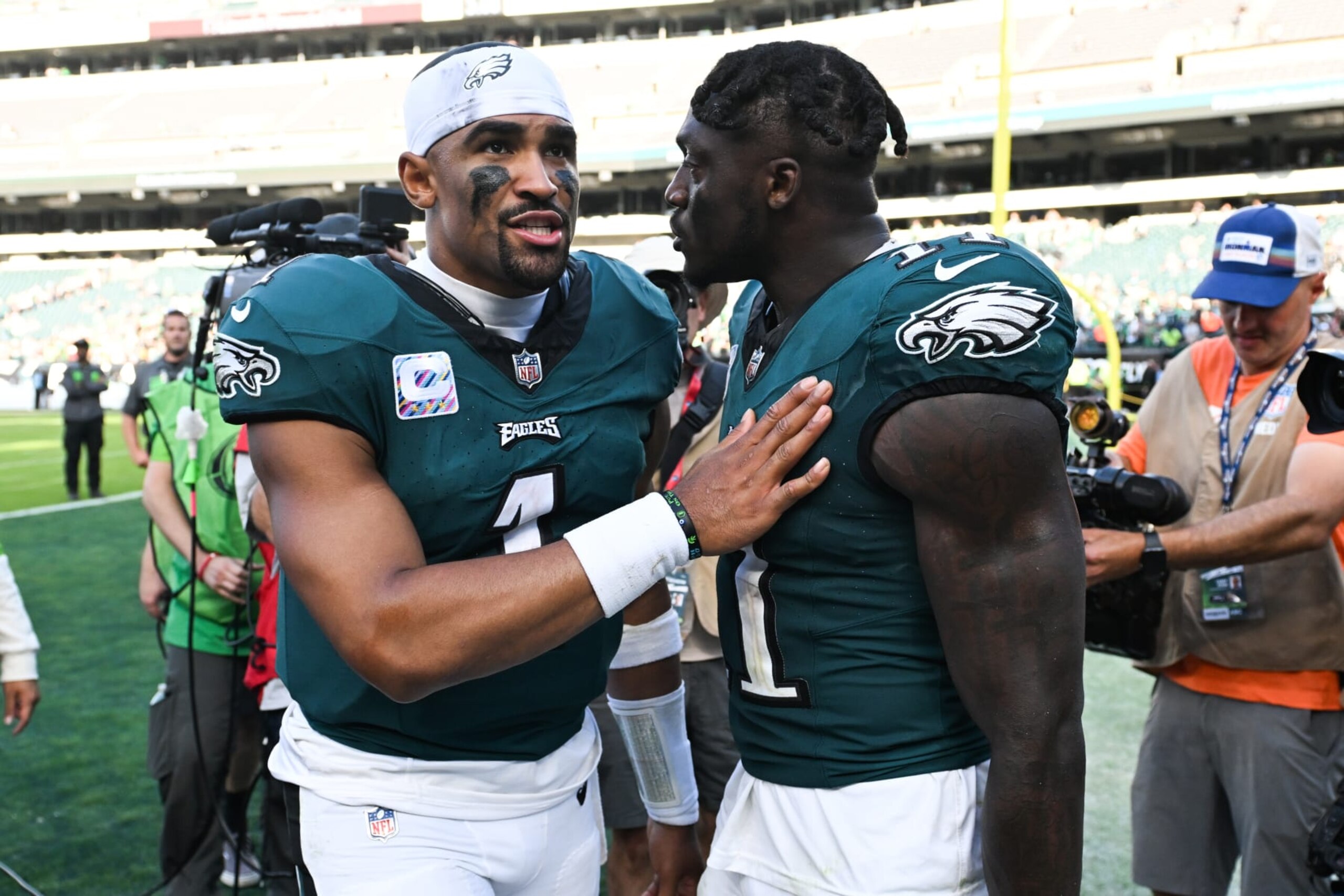 PHILADELPHIA, PA - OCTOBER 01: Jalen Hurts #1 meets with A.J. Brown #11 of the Philadelphia Eagles following an overtime win against the Washington Commanders at Lincoln Financial Field on October 1, 2023 in Philadelphia, Pennsylvania. (Photo by Kathryn Riley/Getty Images)