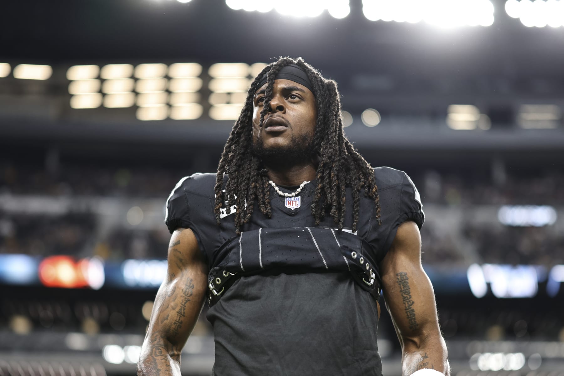LAS VEGAS, NEVADA - OCTOBER 09: Davante Adams #17 of the Las Vegas Raiders stretches as he warms up prior to an NFL football game between the Las Vegas Raiders and the Green Bay Packers at Allegiant Stadium on October 09, 2023 in Las Vegas, Nevada. (Photo by Michael Owens/Getty Images)