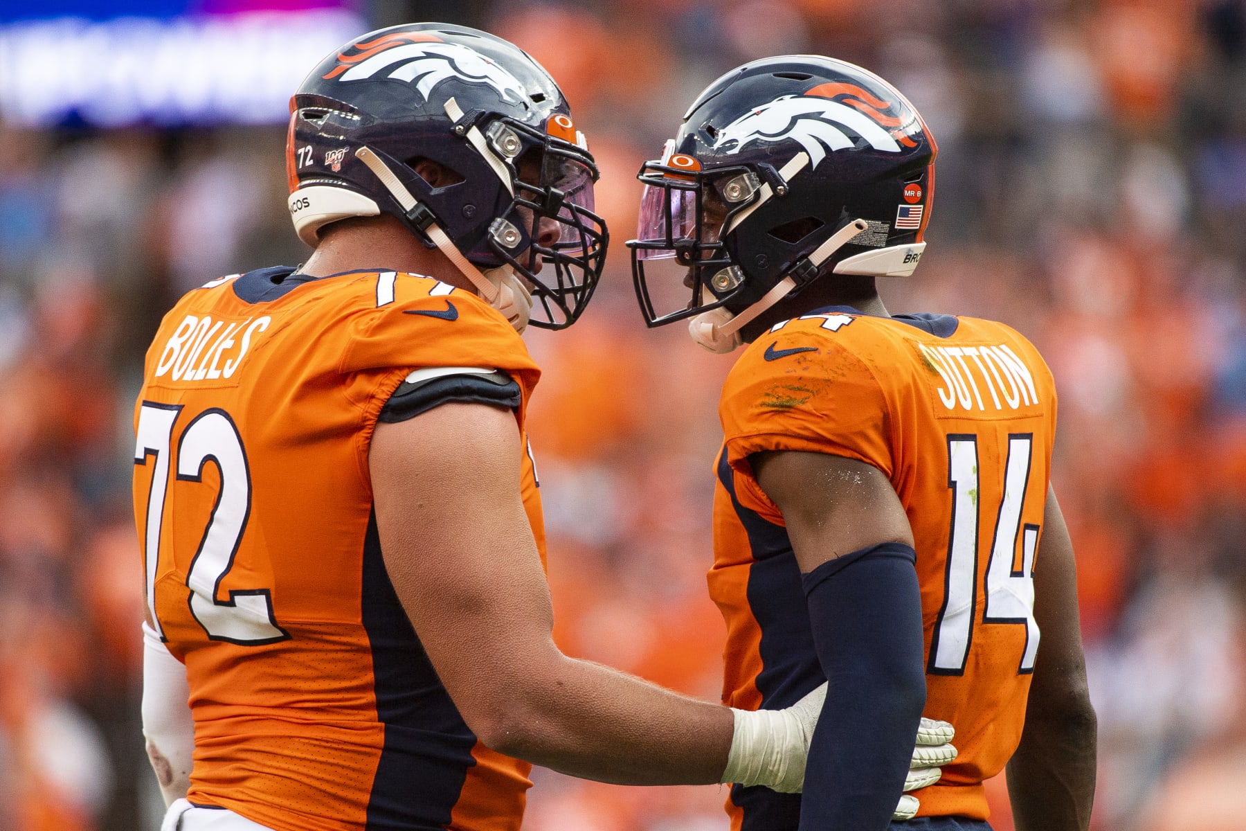 DENVER, CO - SEPTEMBER 15: Garett Bolles #72 of the Denver Broncos speaks with teammate Courtland Sutton during the second half against the Chicago Bears at Empower Field at Mile High on September 15, 2019 in Denver, Colorado. (Photo by Timothy Nwachukwu/Getty Images)