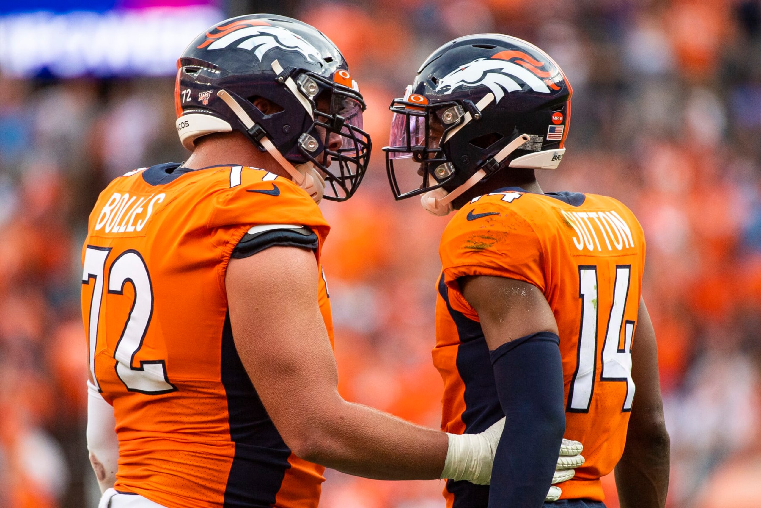 DENVER, CO - SEPTEMBER 15: Garett Bolles #72 of the Denver Broncos speaks with teammate Courtland Sutton during the second half against the Chicago Bears at Empower Field at Mile High on September 15, 2019 in Denver, Colorado. (Photo by Timothy Nwachukwu/Getty Images)