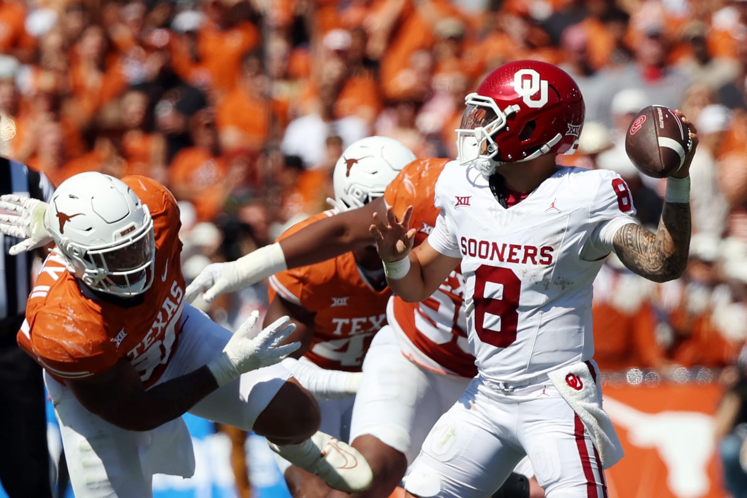 AUSTIN, TEXAS - OCTOBER 07: Dillon Gabriel #8 of the Oklahoma Sooners looks to pass against the Texas Longhorns at the Cotton Bowl on October 07, 2023 in Dallas, Texas. (Photo by Richard Rodriguez/Getty Images)