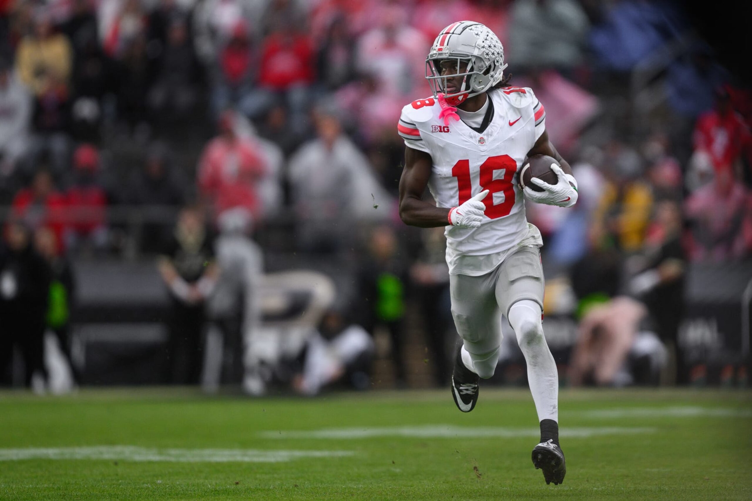 WEST LAFAYETTE, IN - OCTOBER 14: Ohio State Buckeyes wide receiver Marvin Harrison Jr. (18) runs downfield after a catch during the college football game between the Purdue Boilermakers and Ohio State Buckeyes on October 14, 2023, at Ross-Ade Stadium in West Lafayette, IN. (Photo by Zach Bolinger/Icon Sportswire via Getty Images)