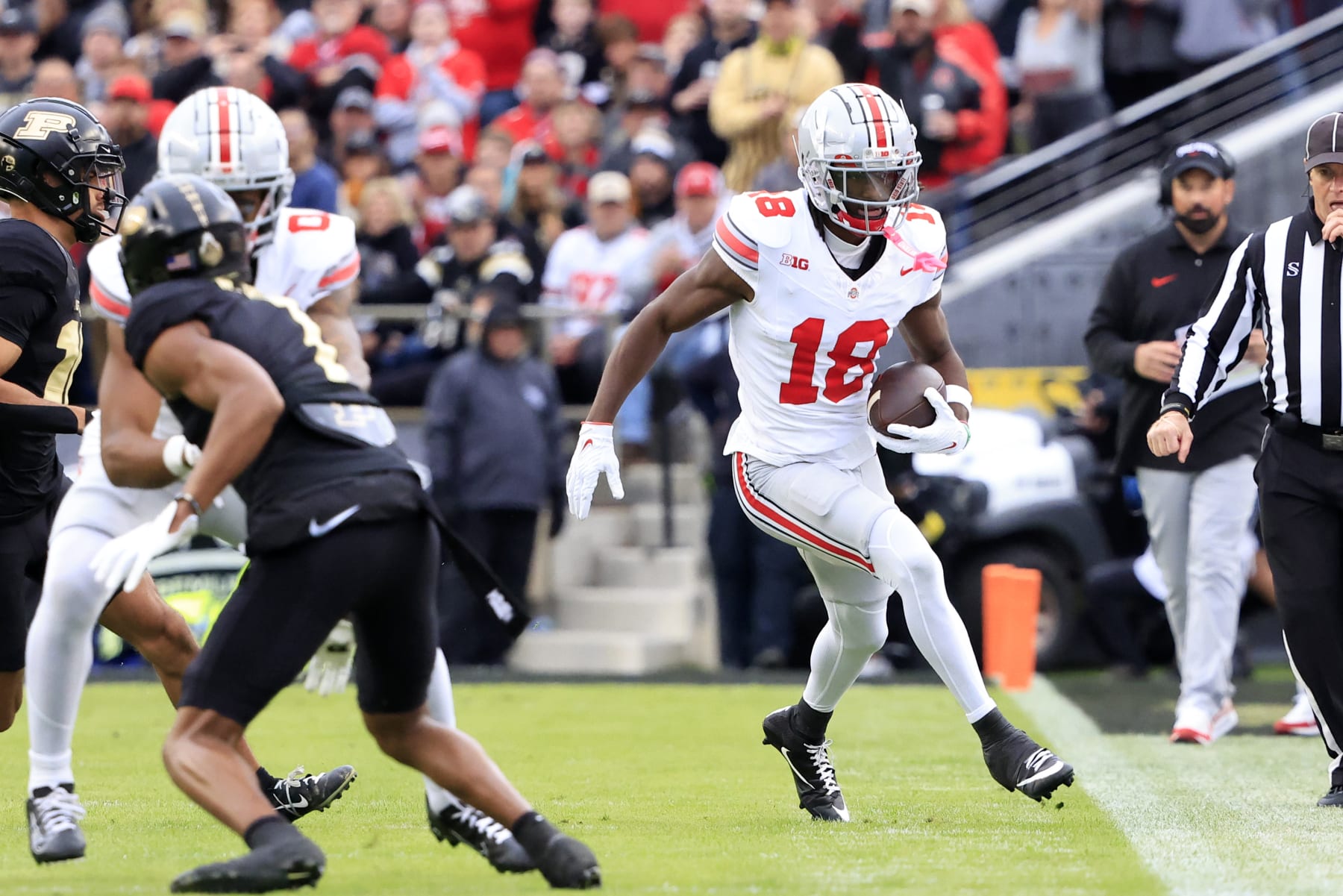 WEST LAFAYETTE, INDIANA - OCTOBER 14: Marvin Harrison Jr. #18 of the Ohio State Buckeyes runs out of bounds in the game against the Purdue Boilermakers at Ross-Ade Stadium on October 14, 2023 in West Lafayette, Indiana. (Photo by Justin Casterline/Getty Images)