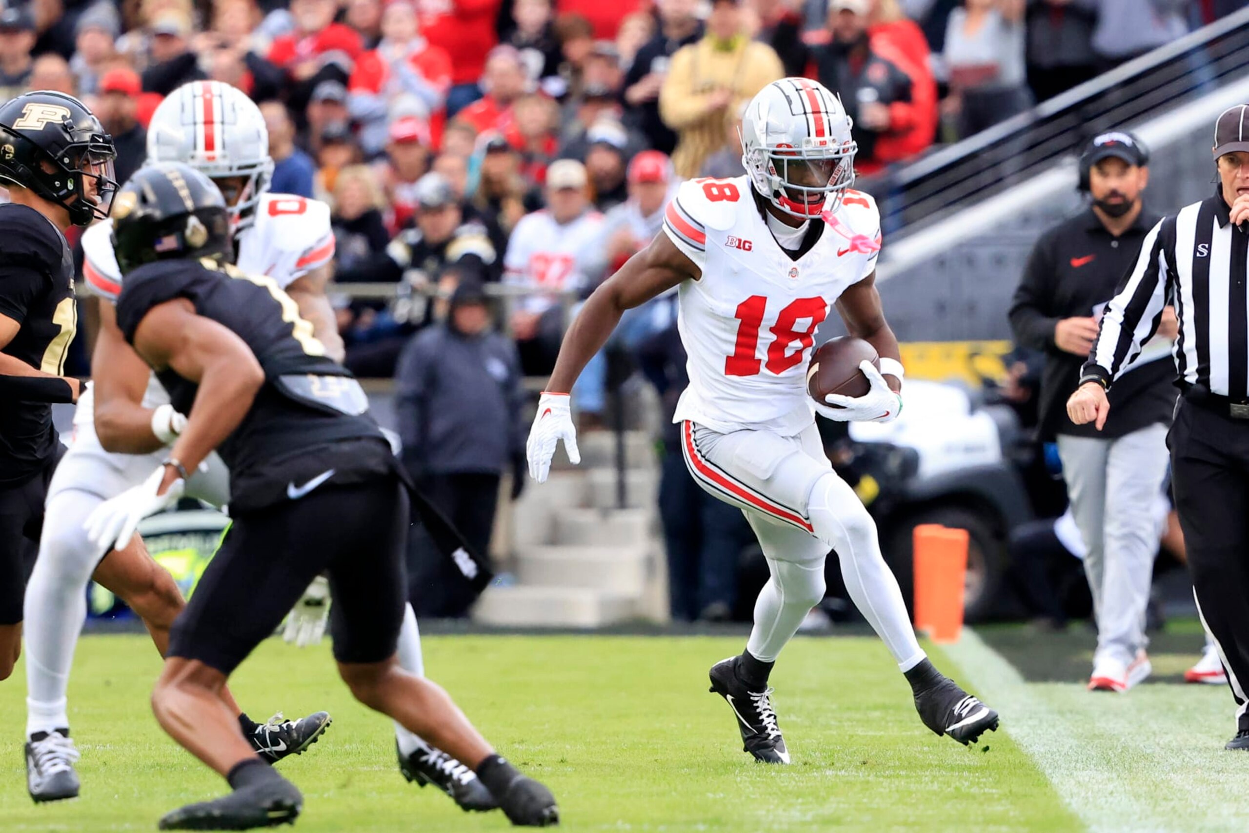 WEST LAFAYETTE, INDIANA - OCTOBER 14: Marvin Harrison Jr. #18 of the Ohio State Buckeyes runs out of bounds in the game against the Purdue Boilermakers at Ross-Ade Stadium on October 14, 2023 in West Lafayette, Indiana. (Photo by Justin Casterline/Getty Images)