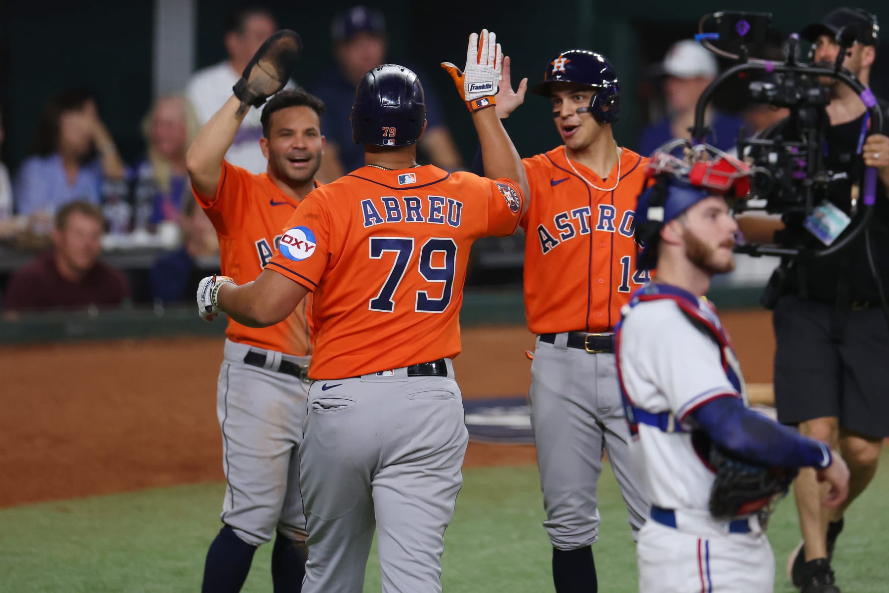 ARLINGTON, TEXAS - OCTOBER 19: José Abreu #79 of the Houston Astros celebrates with teammates after hitting a home run in the fourth inning against the Texas Rangers during Game Four of the Championship Series at Globe Life Field on October 19, 2023 in Arlington, Texas. (Photo by Richard Rodriguez/Getty Images)