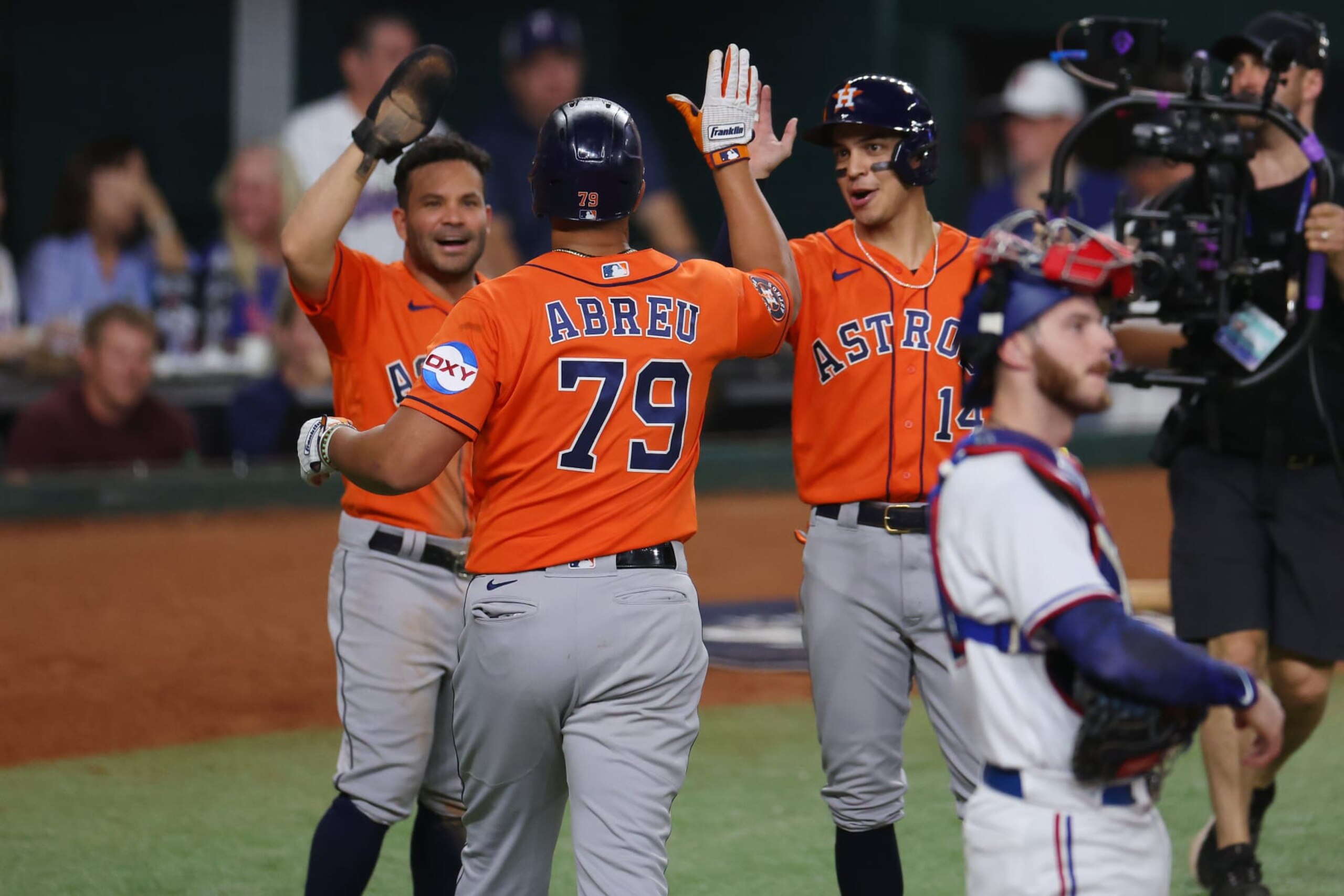 ARLINGTON, TEXAS - OCTOBER 19: José Abreu #79 of the Houston Astros celebrates with teammates after hitting a home run in the fourth inning against the Texas Rangers during Game Four of the Championship Series at Globe Life Field on October 19, 2023 in Arlington, Texas. (Photo by Richard Rodriguez/Getty Images)