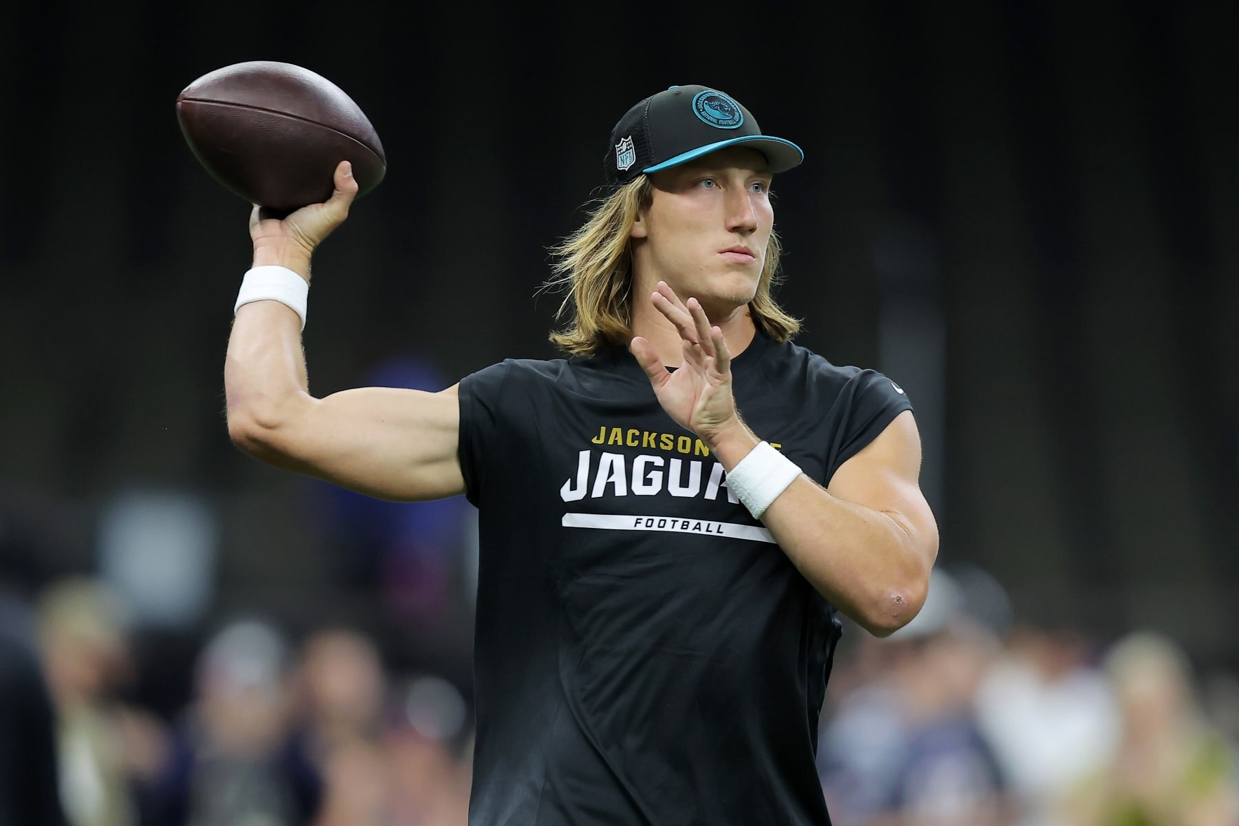 NEW ORLEANS, LOUISIANA - OCTOBER 19: Trevor Lawrence #16 of the Jacksonville Jaguars warms up before the game against the New Orleans Saints at Caesars Superdome on October 19, 2023 in New Orleans, Louisiana. (Photo by Jonathan Bachman/Getty Images)