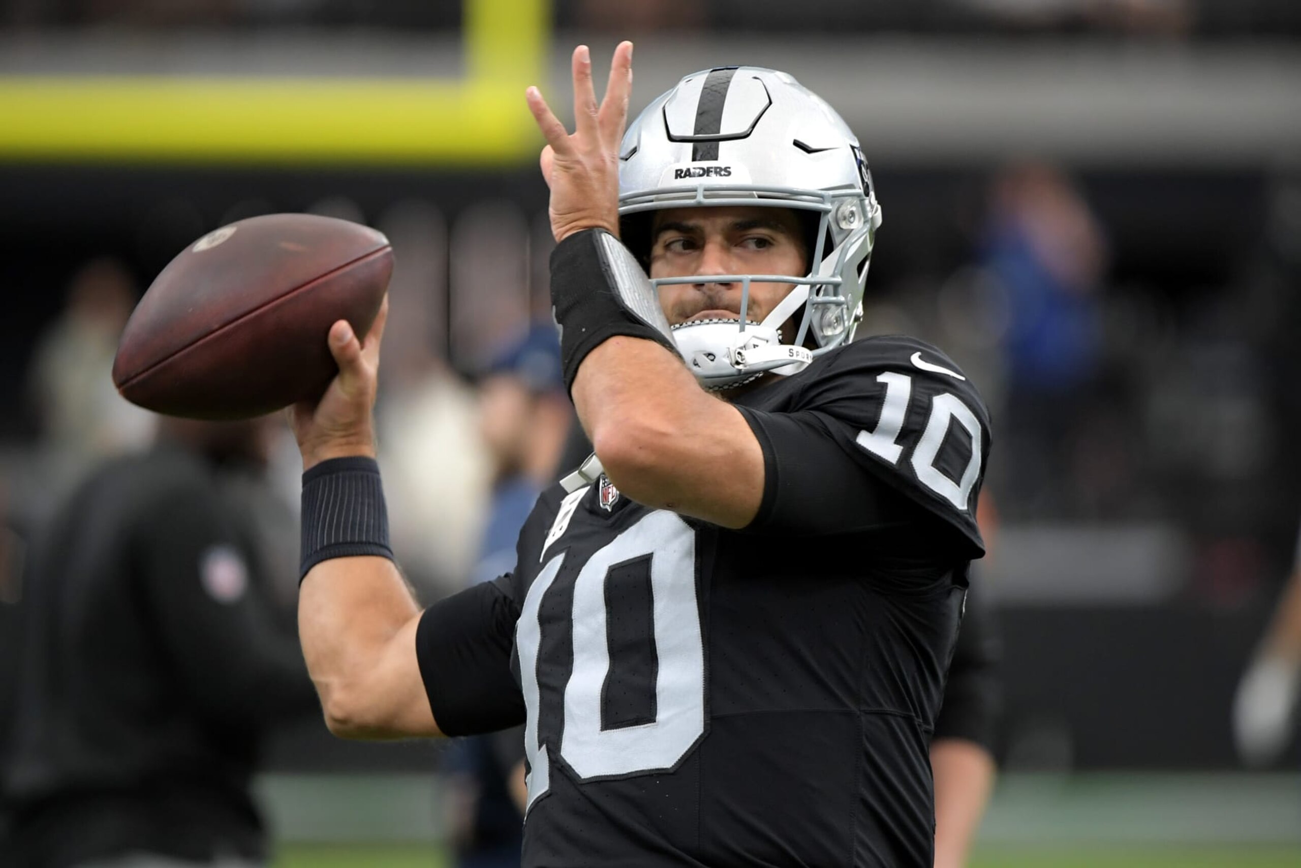 LAS VEGAS, NEVADA - OCTOBER 15: Jimmy Garoppolo #10 of the Las Vegas Raiders warms up prior to a game against the New England Patriots at Allegiant Stadium on October 15, 2023 in Las Vegas, Nevada. (Photo by Sam Morris/Getty Images)