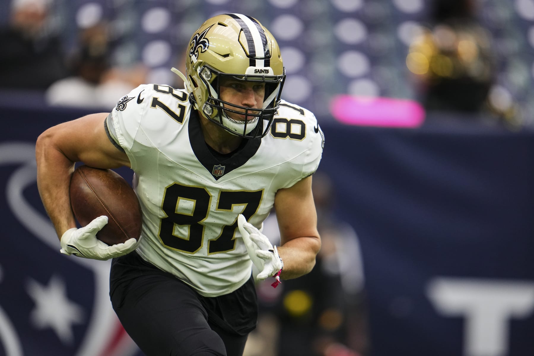 HOUSTON, TX - OCTOBER 15: Foster Moreau #87 of the New Orleans Saints warms up prior to an NFL football game against the Houston Texans at NRG Stadium on October 15, 2023 in Houston, Texas. (Photo by Cooper Neill/Getty Images)