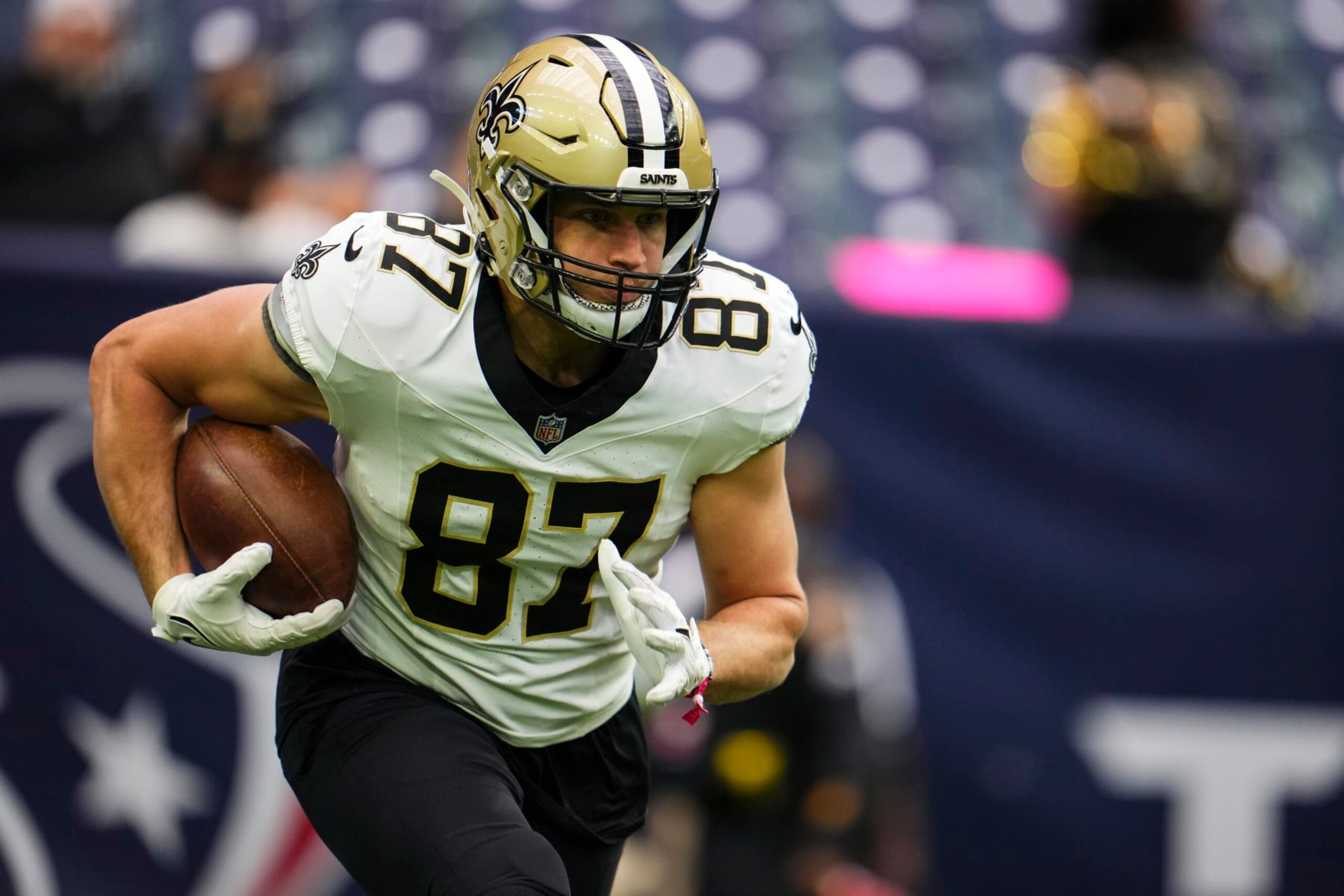 HOUSTON, TX - OCTOBER 15: Foster Moreau #87 of the New Orleans Saints warms up prior to an NFL football game against the Houston Texans at NRG Stadium on October 15, 2023 in Houston, Texas. (Photo by Cooper Neill/Getty Images)