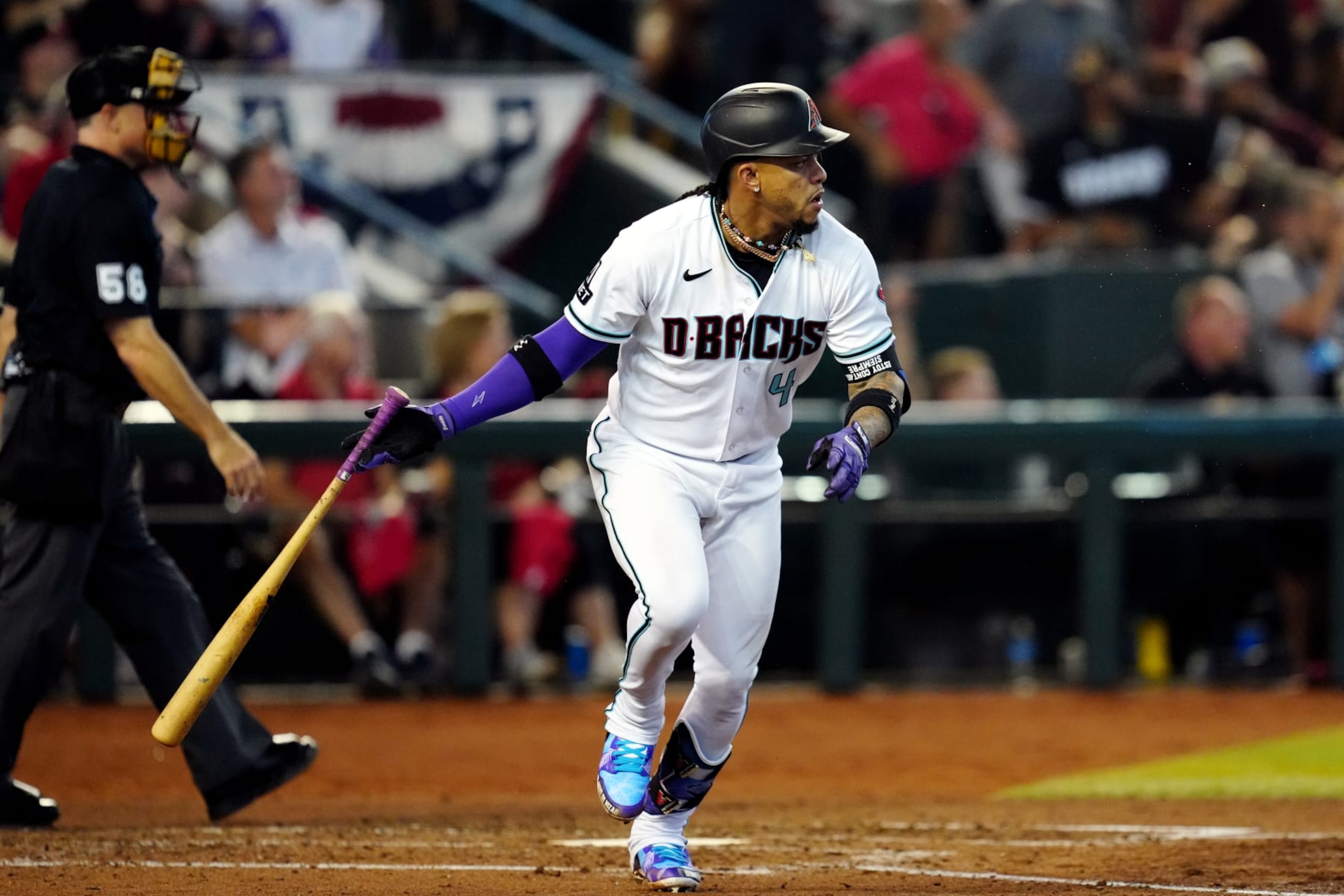 PHOENIX, AZ - OCTOBER 19:  Ketel Marte #4 of the Arizona Diamondbacks doubles in the sixth inning during Game 3 of the NLCS between the Philadelphia Phillies and the Arizona Diamondbacks at Chase Field on Thursday, October 19, 2023 in Phoenix, Arizona. (Photo by Mary DeCicco/MLB Photos via Getty Images)