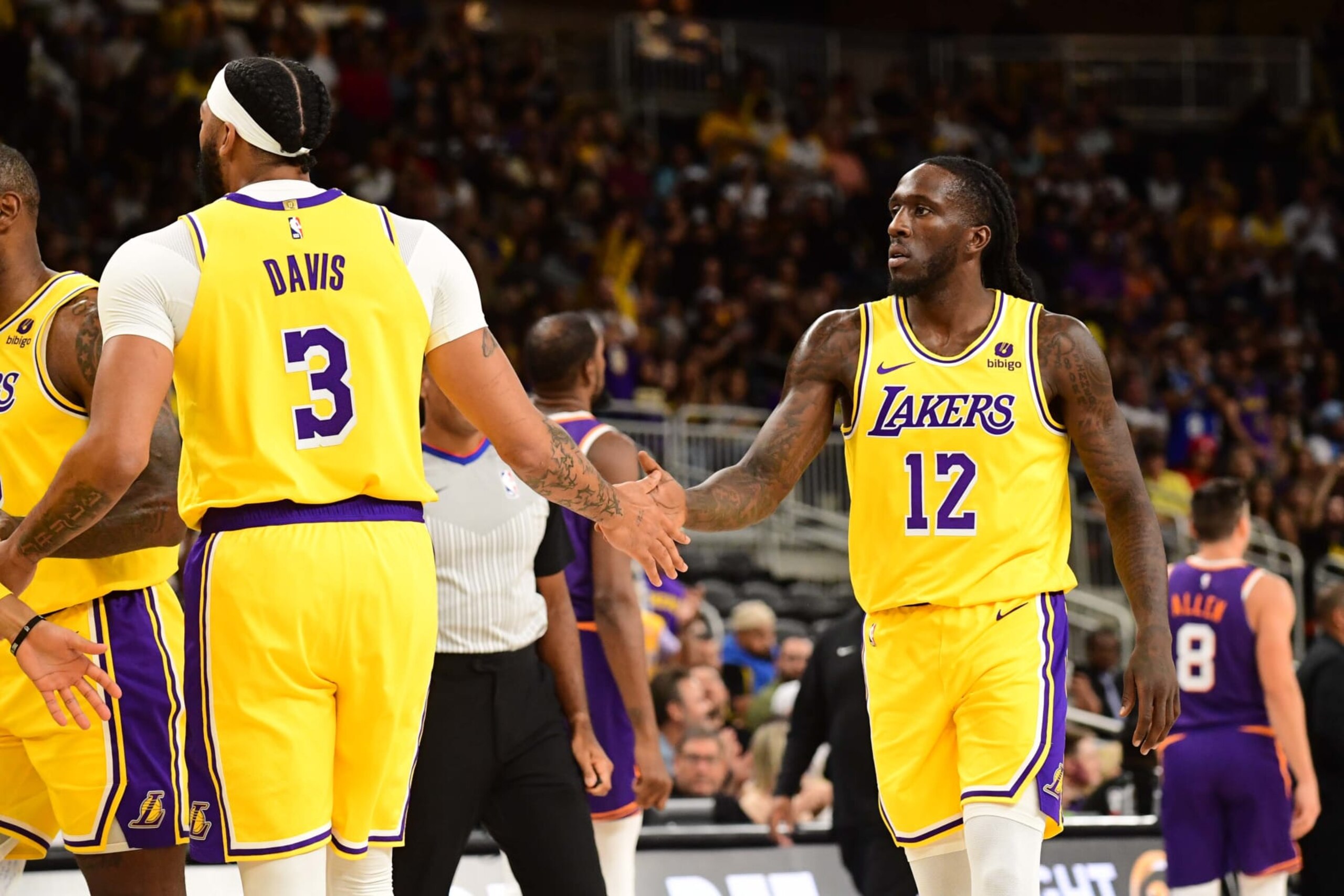 PALM SPRINGS, CA - OCTOBER 19: Anthony Davis #3 and Taurean Prince #12 of the Los Angeles Lakers high five during the game against the Phoenix Suns on October 19, 2023 at the Acrisure Arena in Palm Springs, California. NOTE TO USER: User expressly acknowledges and agrees that, by downloading and/or using this Photograph, user is consenting to the terms and conditions of the Getty Images License Agreement. Mandatory Copyright Notice: Copyright 2023 NBAE (Photo by Adam Pantozzi/NBAE via Getty Images)