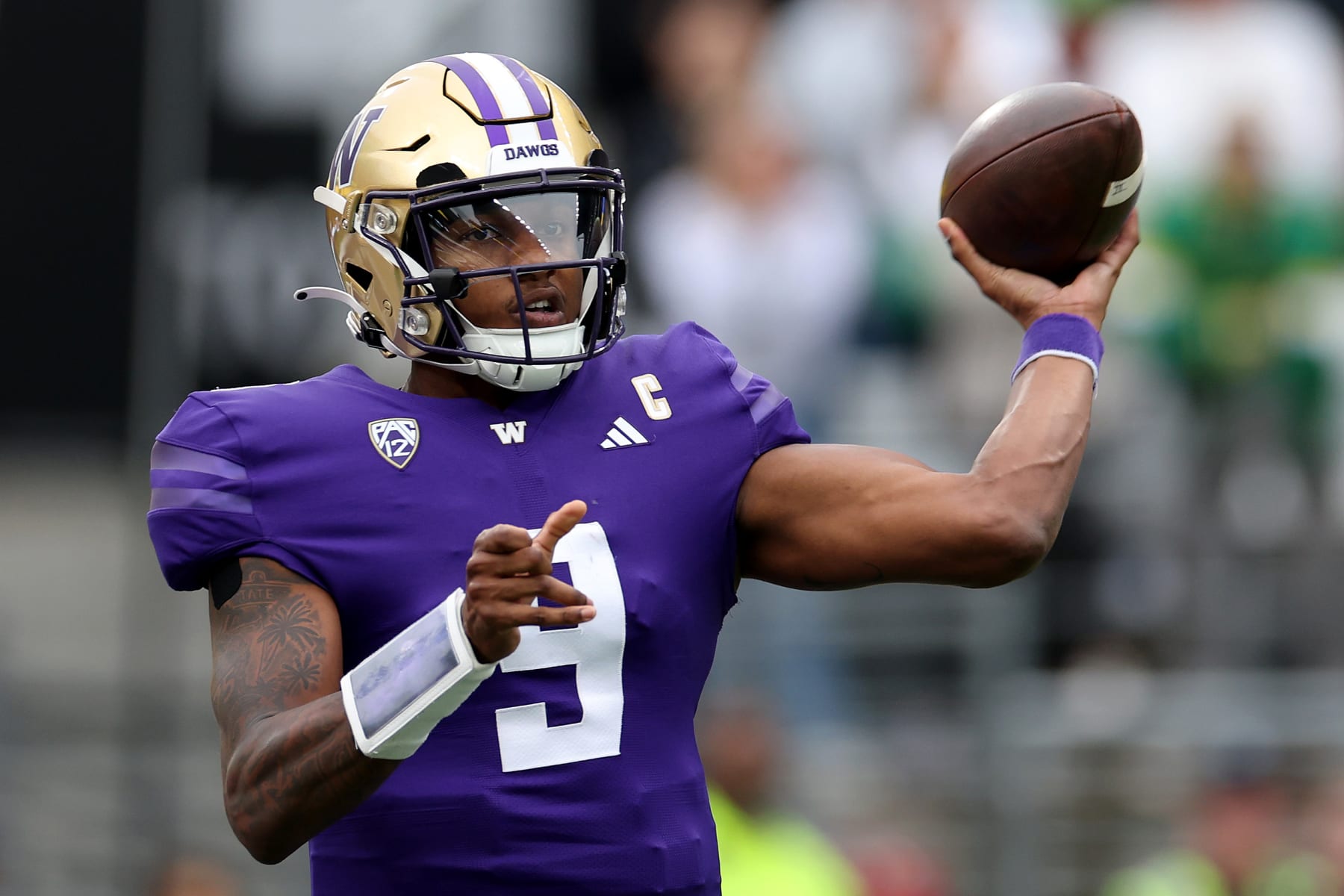 SEATTLE, WASHINGTON - OCTOBER 14: Michael Penix Jr. #9 of the Washington Huskies passes against the Oregon Ducks during the third quarter at Husky Stadium on October 14, 2023 in Seattle, Washington. (Photo by Steph Chambers/Getty Images)
