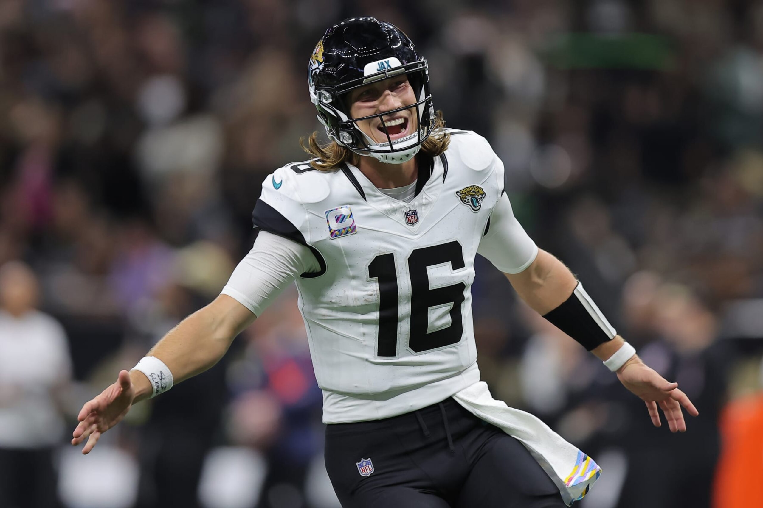 NEW ORLEANS, LOUISIANA - OCTOBER 19: Trevor Lawrence #16 of the Jacksonville Jaguars celebrates after throwing a 44-yard touchdown pass to Christian Kirk #13 (not pictured) during the fourth quarter against the New Orleans Saints at Caesars Superdome on October 19, 2023 in New Orleans, Louisiana. (Photo by Jonathan Bachman/Getty Images)